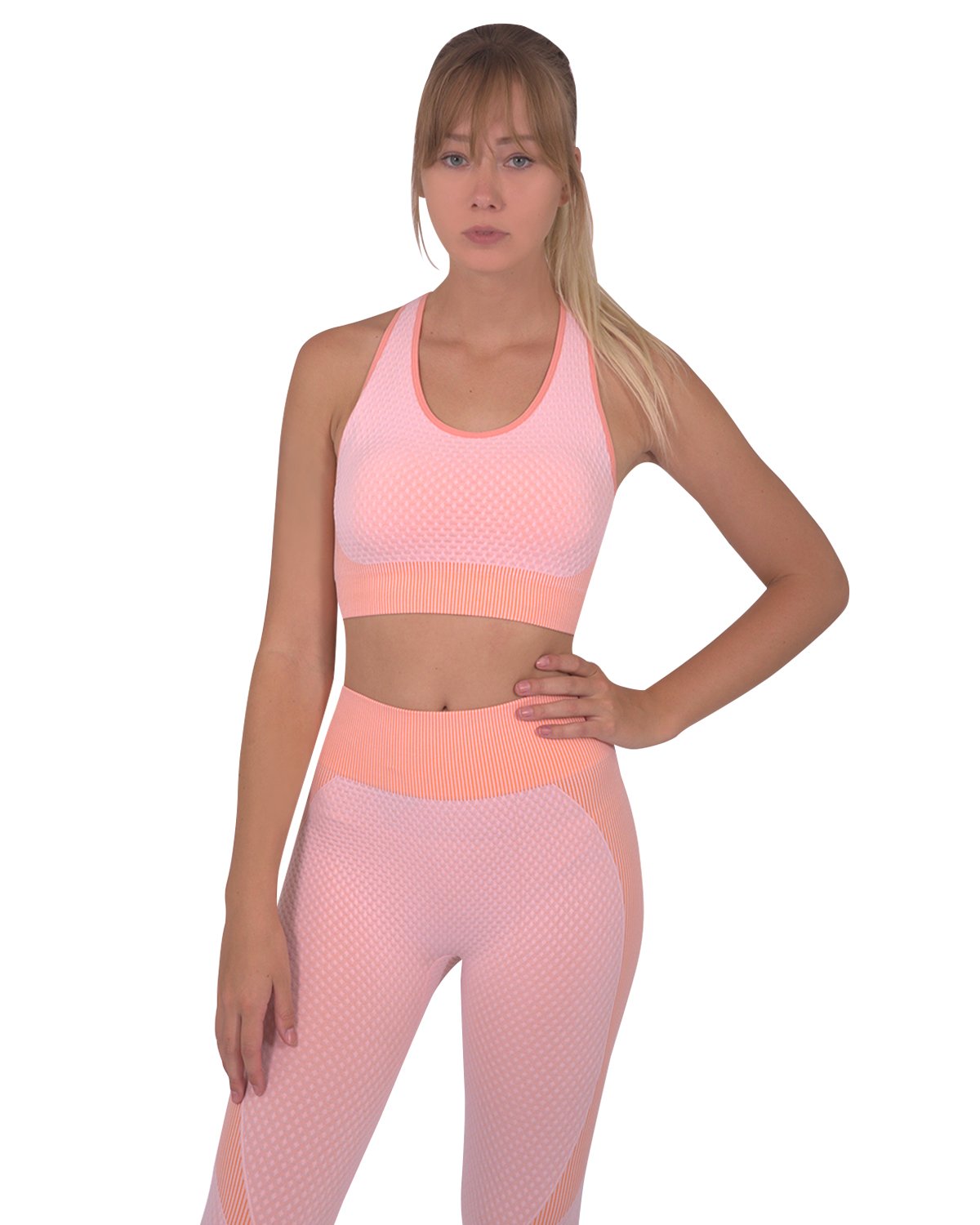 Trois Seamless Sports Bra in pink with orange stripes and cross-over back straps, showcasing its unique design and stylish appearance.