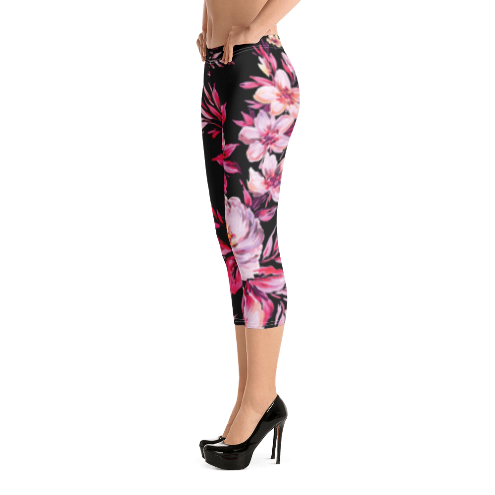 Women All Over Print Flowers Capri Leggings featuring a vibrant floral design, made from soft and stretchy fabric for comfort.