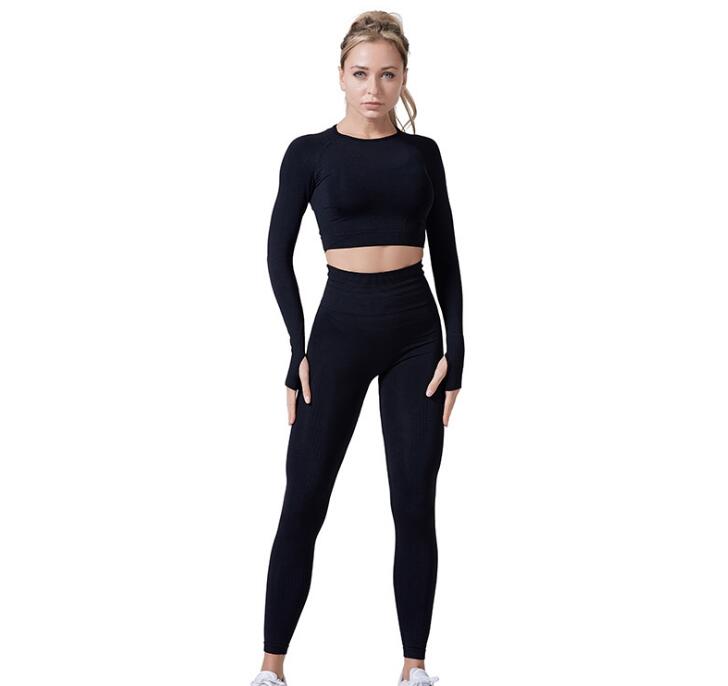 Women Vital Seamless Yoga Set featuring leggings and cropped shirt in a stylish design, made from high-quality nylon material for comfort and performance.