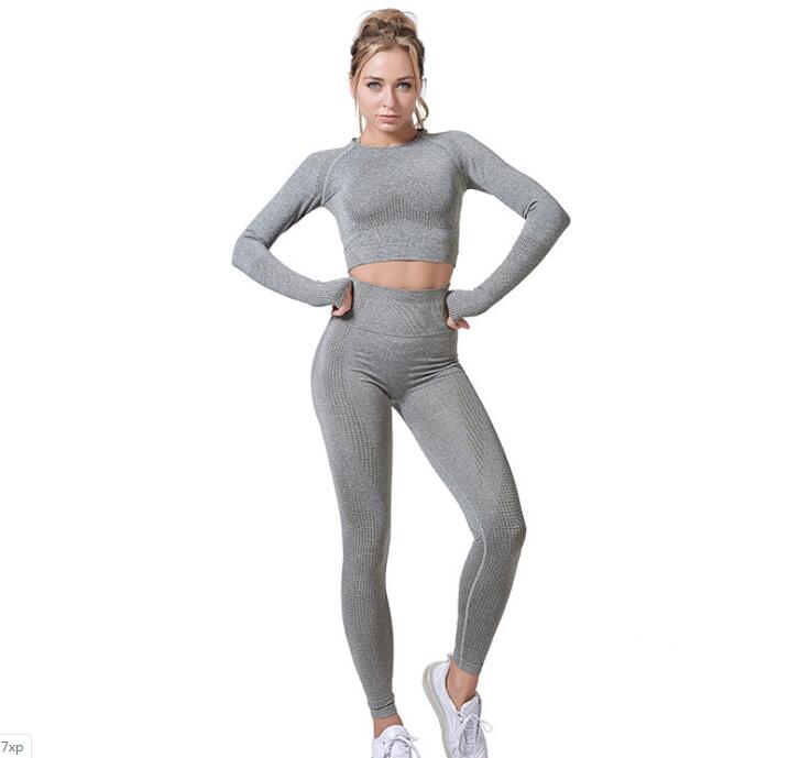 Women Vital Seamless Yoga Set featuring leggings and cropped shirt in a stylish design, made from high-quality nylon material for comfort and performance.