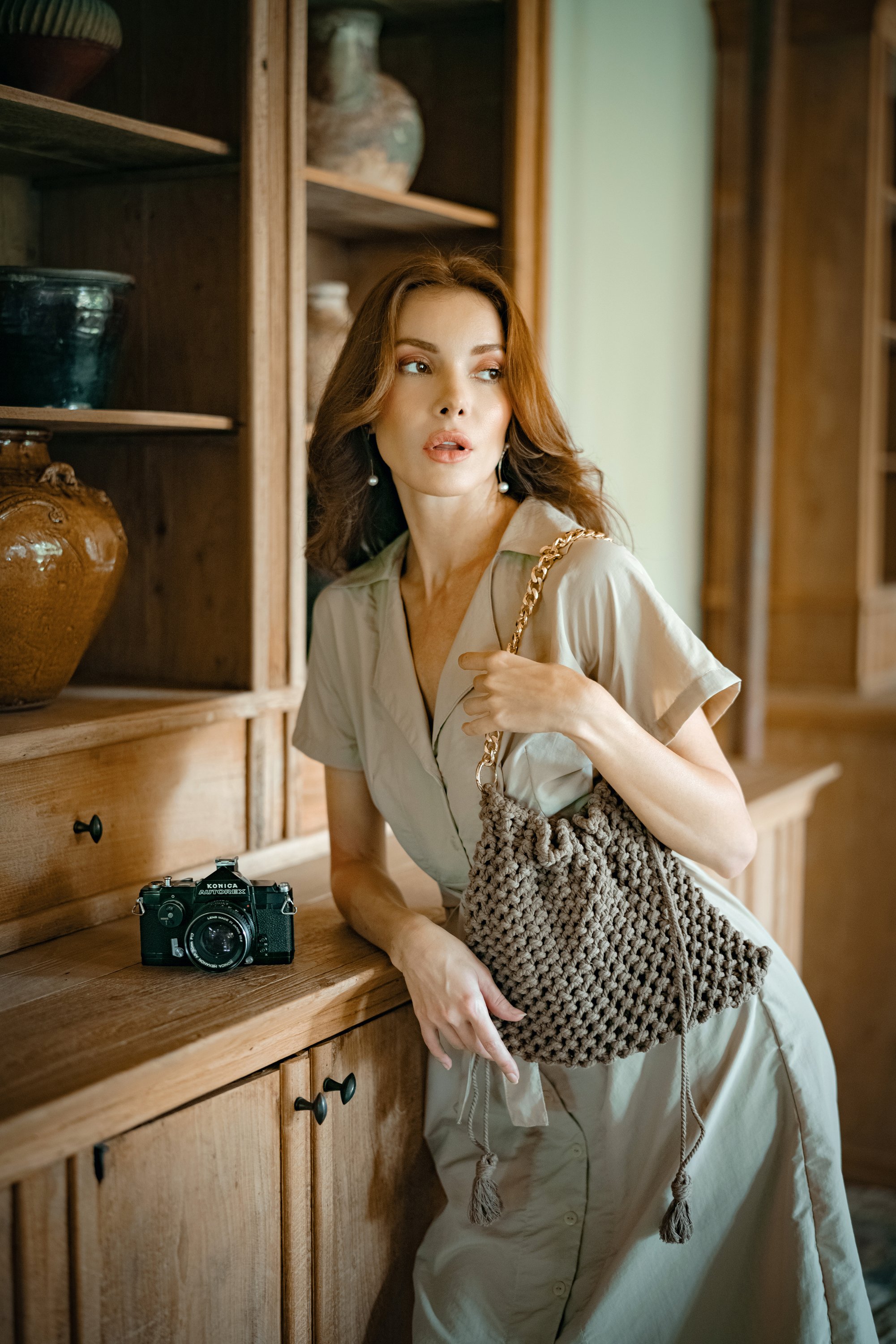 ARYA Safari Linen Midi Dress in Beige, featuring a button-down closure, belt, and spacious pockets, made from recycled fabric.