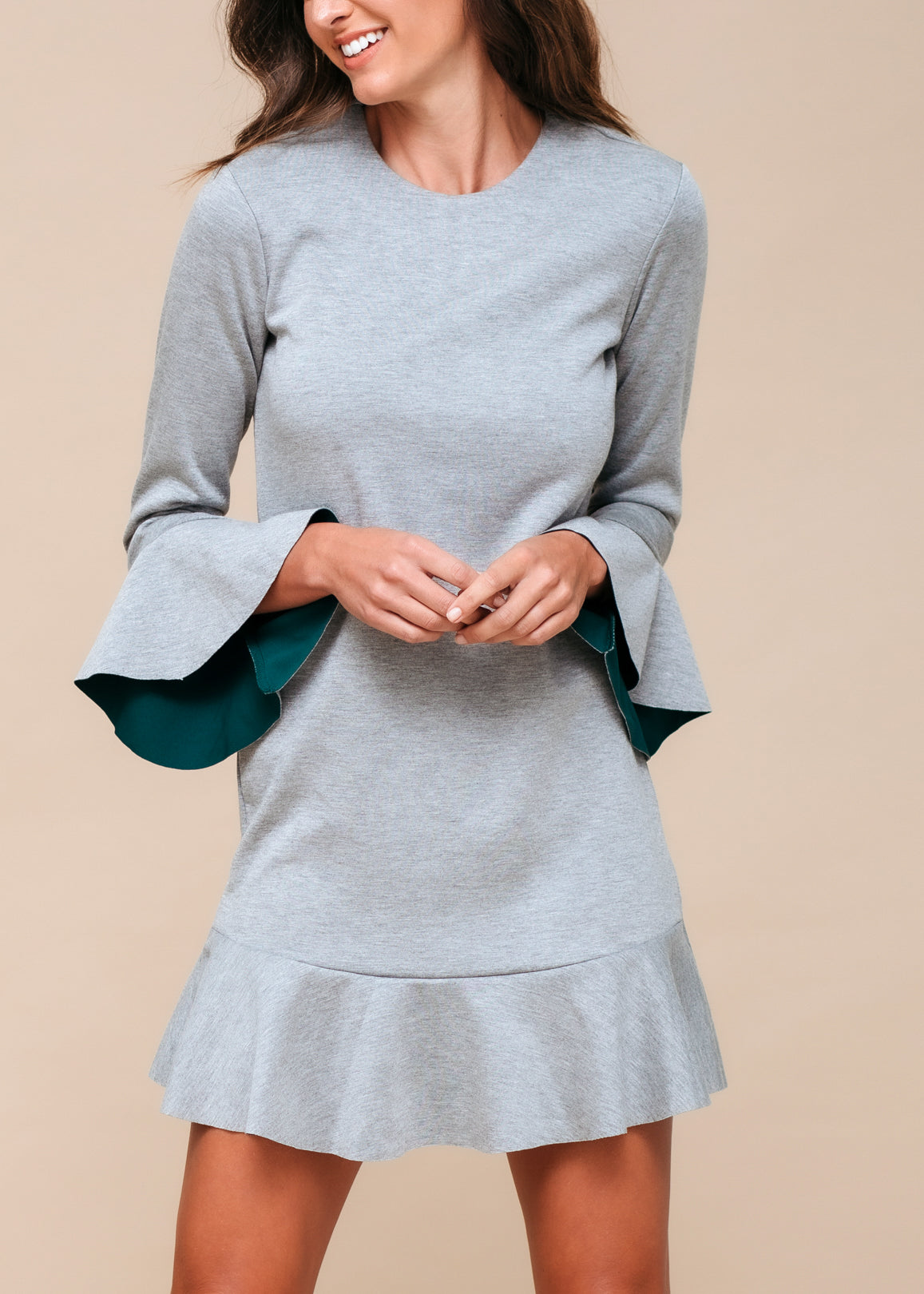 A stylish women's bell sleeve shift dress in heather grey, featuring a crewneck and flared sleeves, perfect for casual outings.