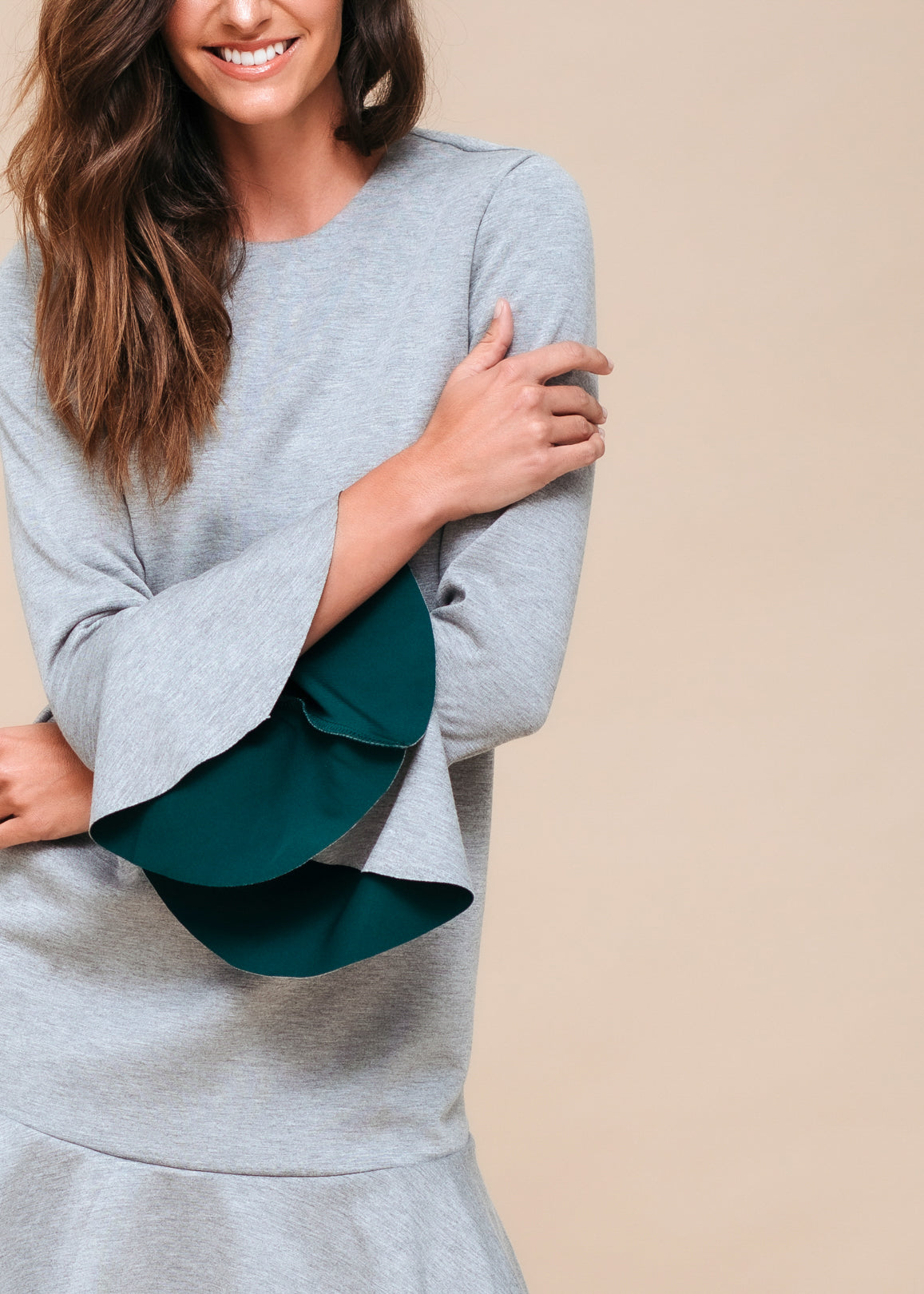 A stylish women's bell sleeve shift dress in heather grey, featuring a crewneck and flared sleeves, perfect for casual outings.