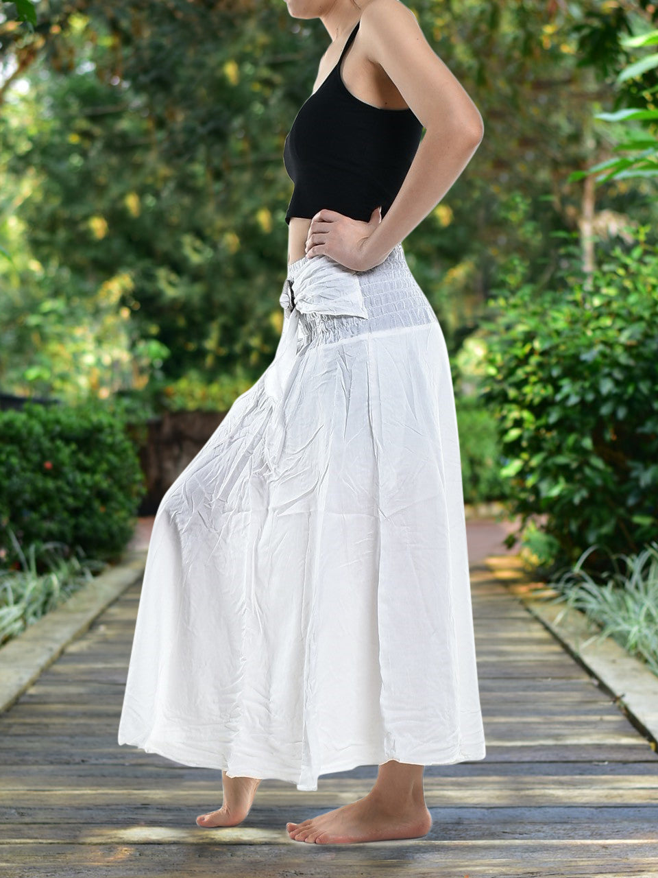 Bohotusk Plain White Beach Dress displayed on a mannequin, featuring a coconut buckle and elasticated smocked waist, perfect for summer wear.