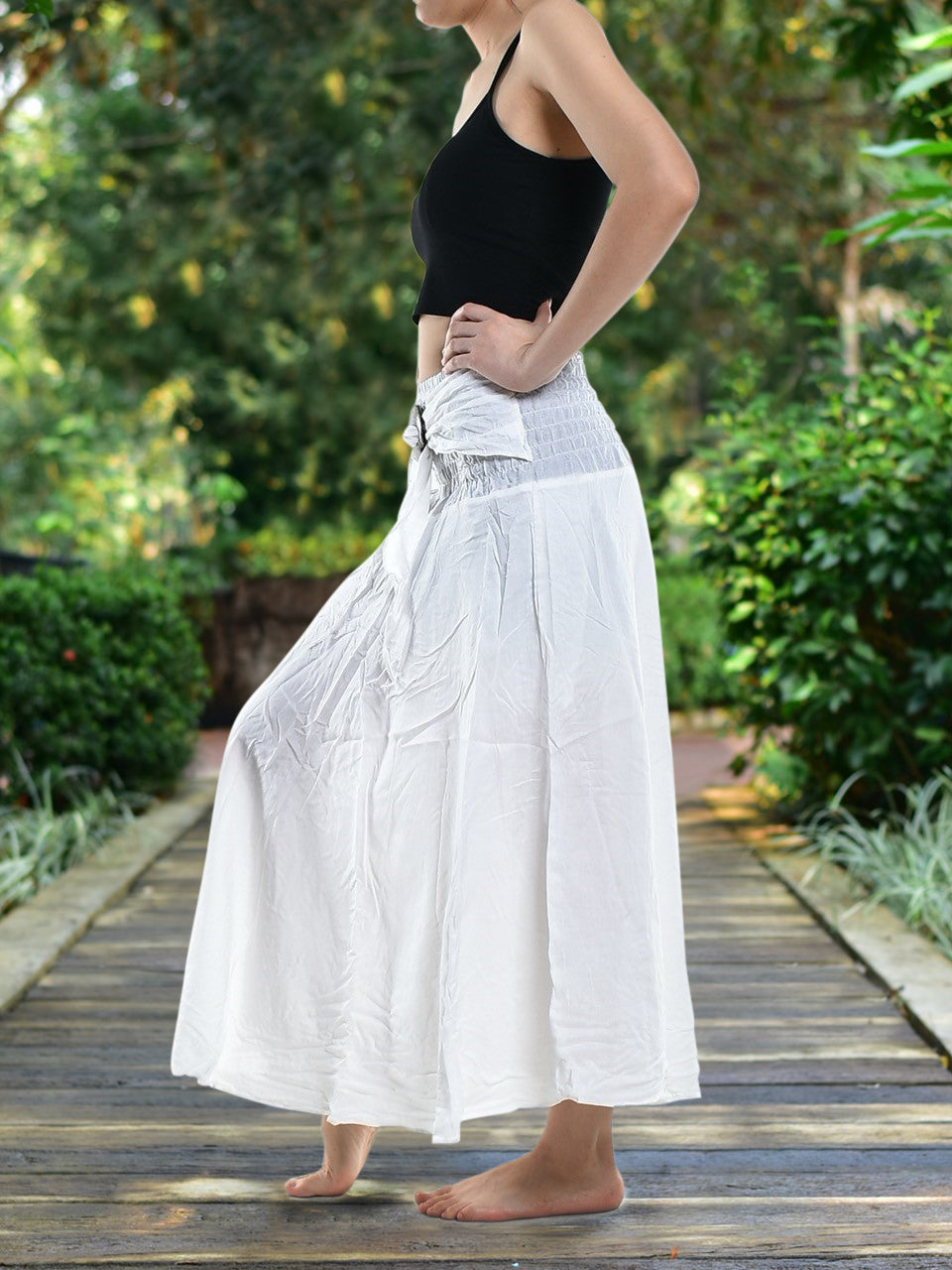 Bohotusk Plain White Beach Dress displayed on a mannequin, featuring a coconut buckle and elasticated smocked waist, perfect for summer wear.