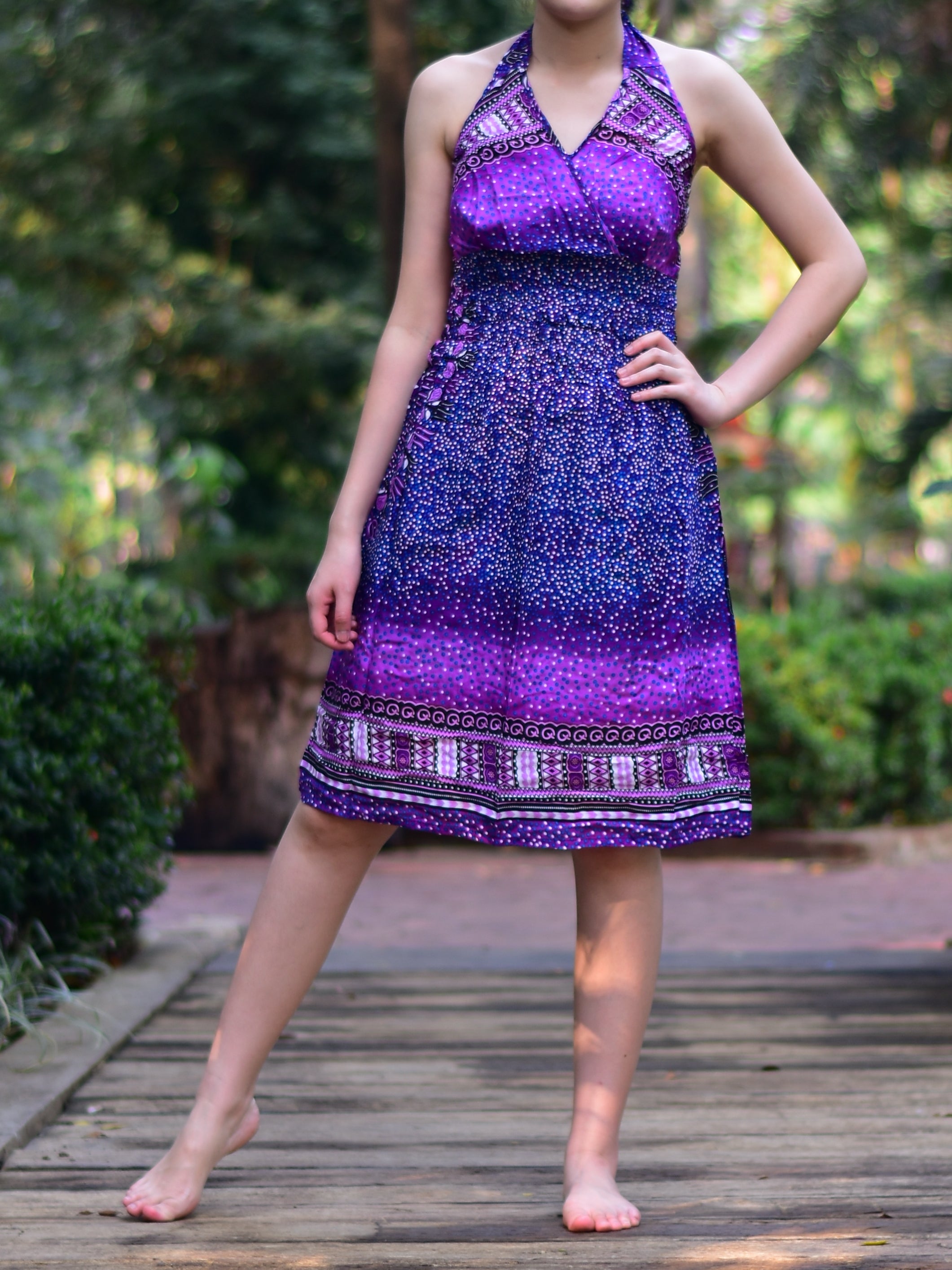 Bohotusk Purple Night Sky Tie Neck Knee Length Dress featuring a stylish tie neck and elasticated smocked chest, perfect for summer wear.