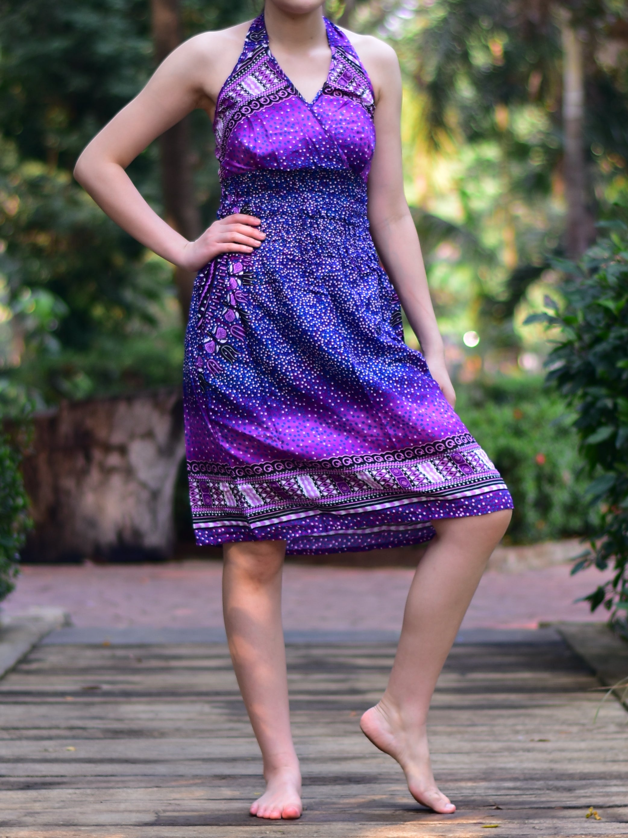 Bohotusk Purple Night Sky Tie Neck Knee Length Dress featuring a stylish tie neck and elasticated smocked chest, perfect for summer wear.