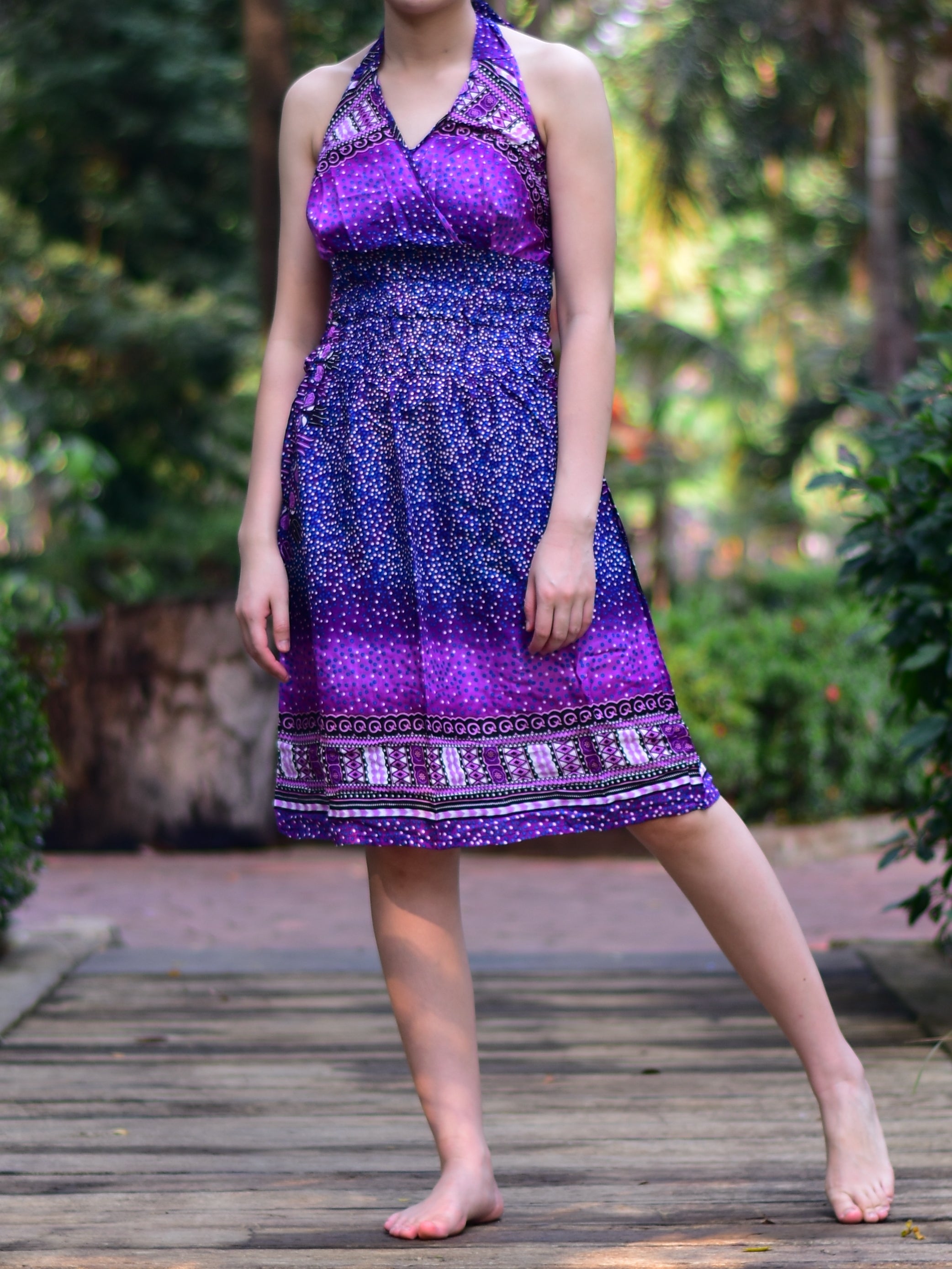 Bohotusk Purple Night Sky Tie Neck Knee Length Dress featuring a stylish tie neck and elasticated smocked chest, perfect for summer wear.