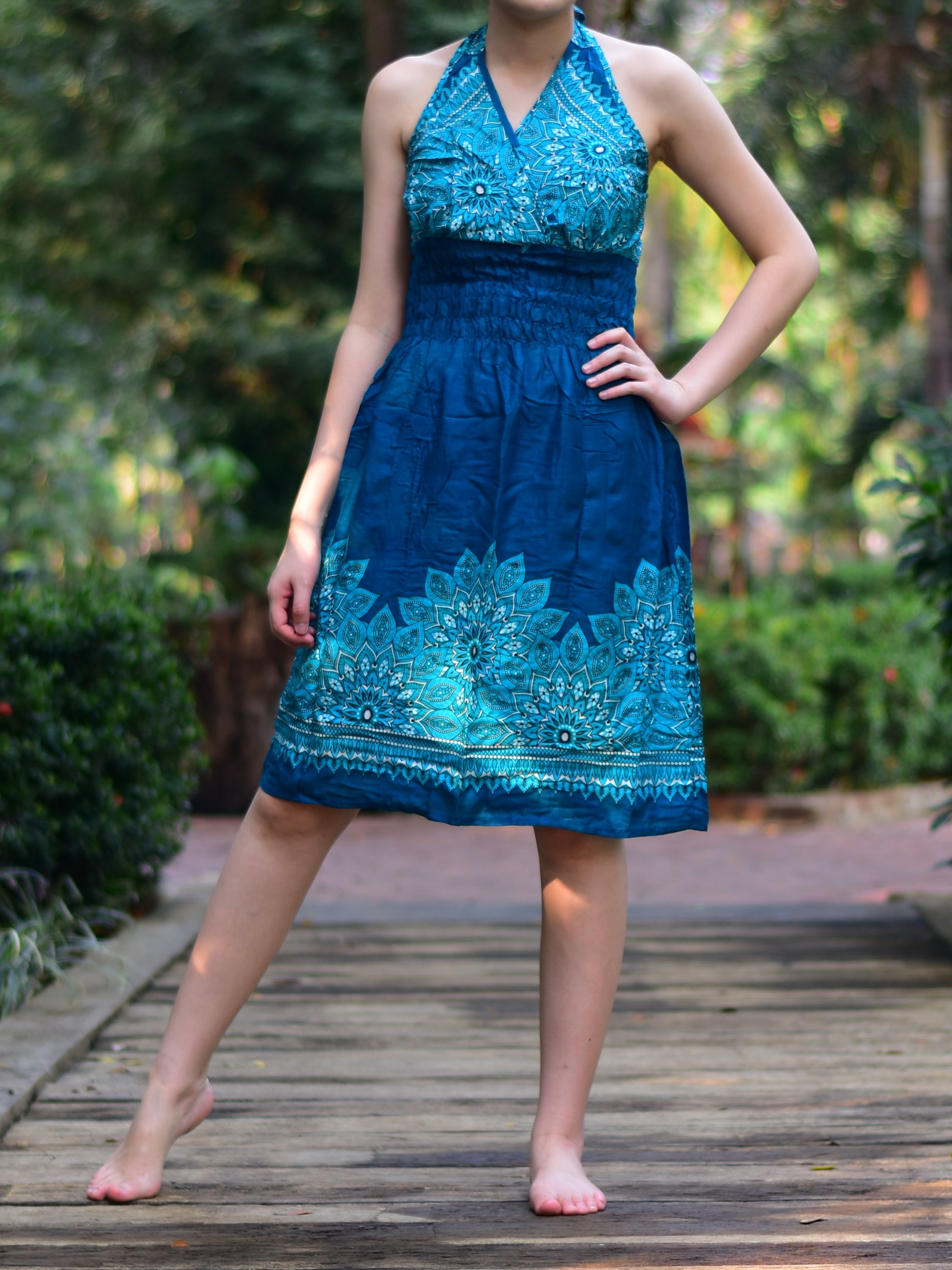 Bohotusk Teal Tigers Eye Tie Neck Knee Length Dress featuring a stylish tie neck and elasticated smocked chest, perfect for summer wear.