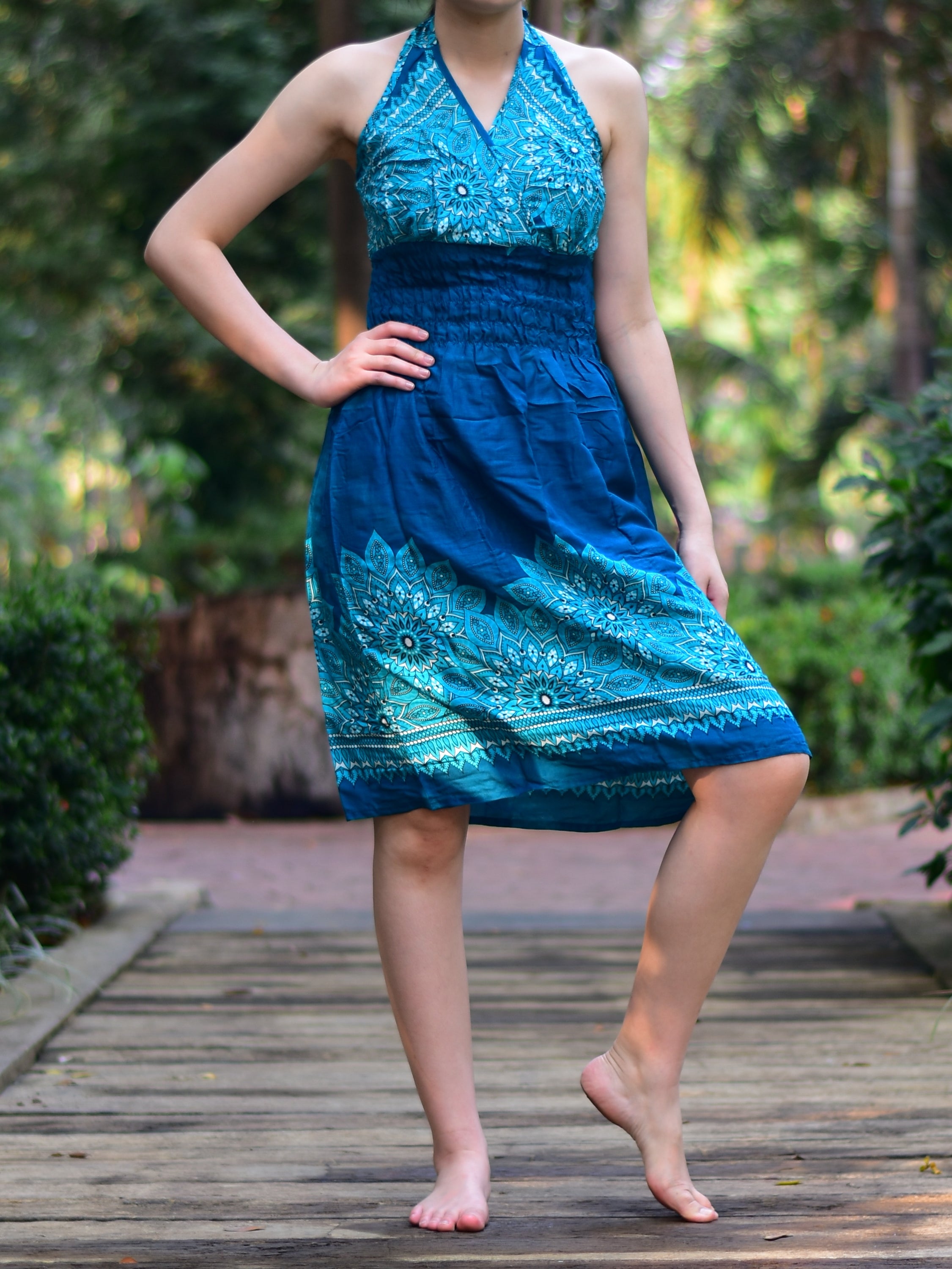 Bohotusk Teal Tigers Eye Tie Neck Knee Length Dress featuring a stylish tie neck and elasticated smocked chest, perfect for summer wear.