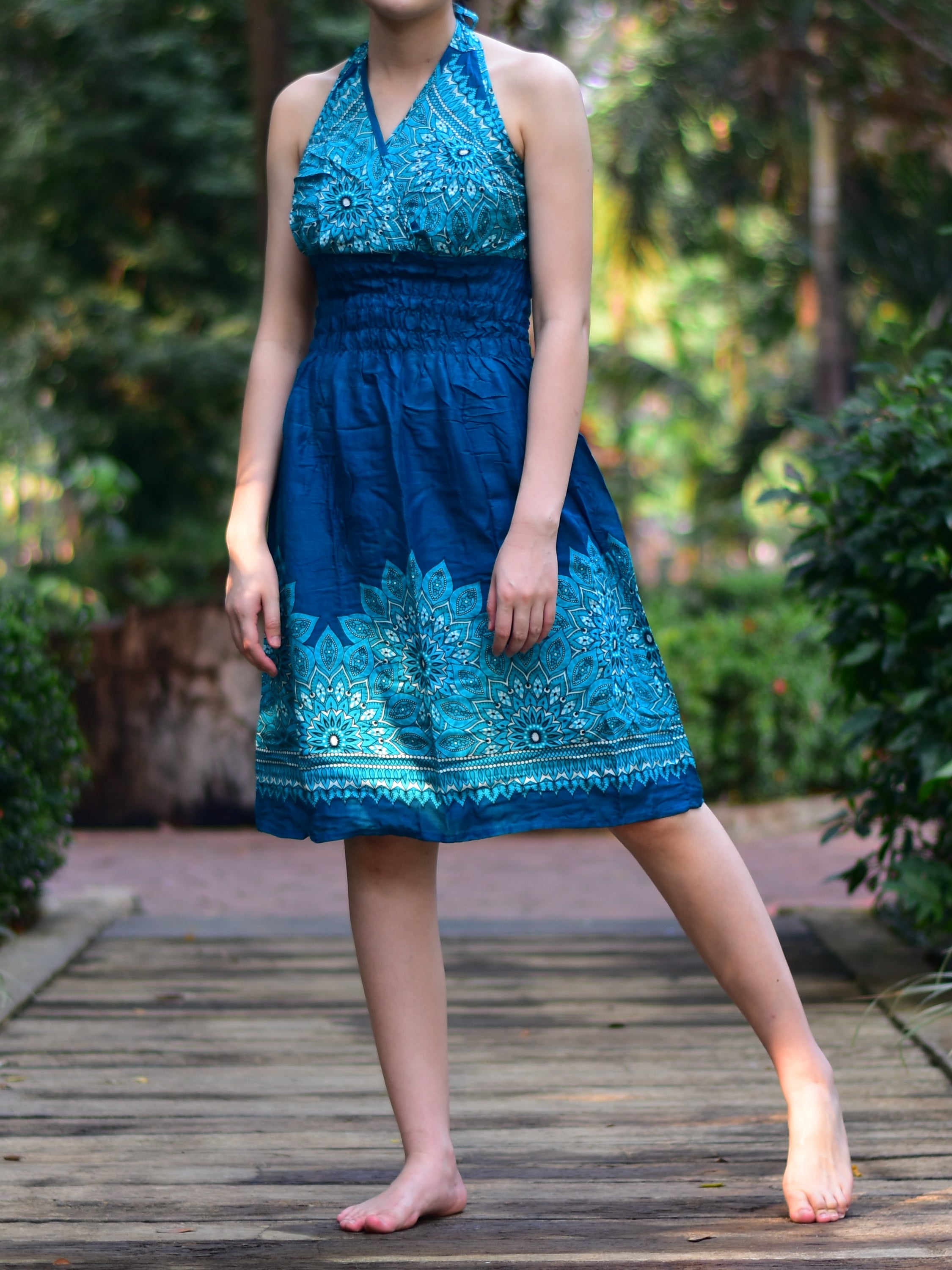 Bohotusk Teal Tigers Eye Tie Neck Knee Length Dress featuring a stylish tie neck and elasticated smocked chest, perfect for summer wear.