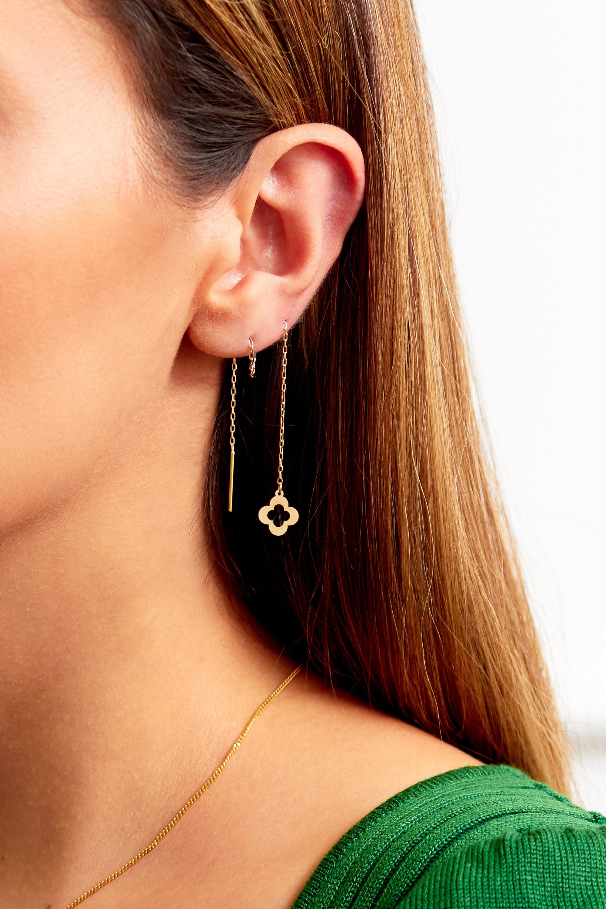 Elegant 18K gold Clover Drop Earrings with a threader design, showcasing a minimalist clover shape.