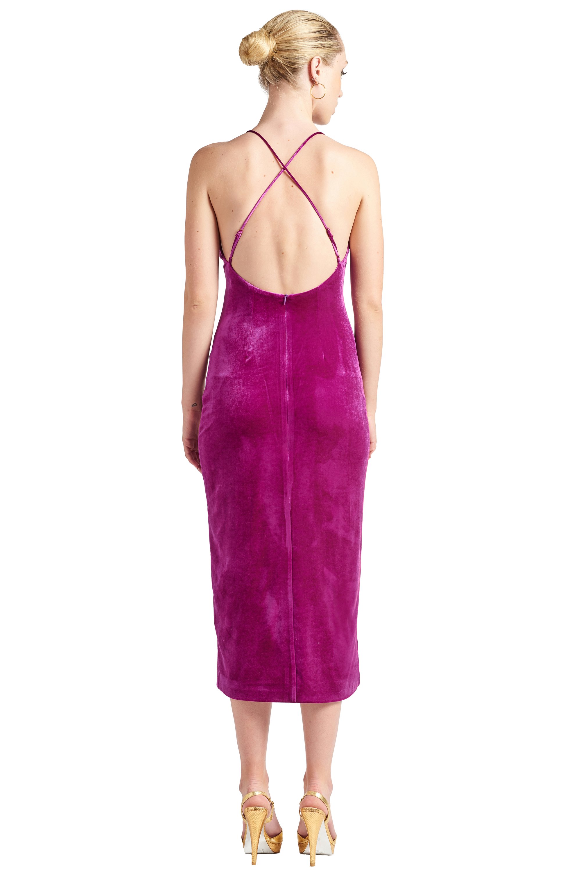 Elle Dress in Magenta, featuring a scooped back and thigh-high slit, made from luxurious stretch velvet.