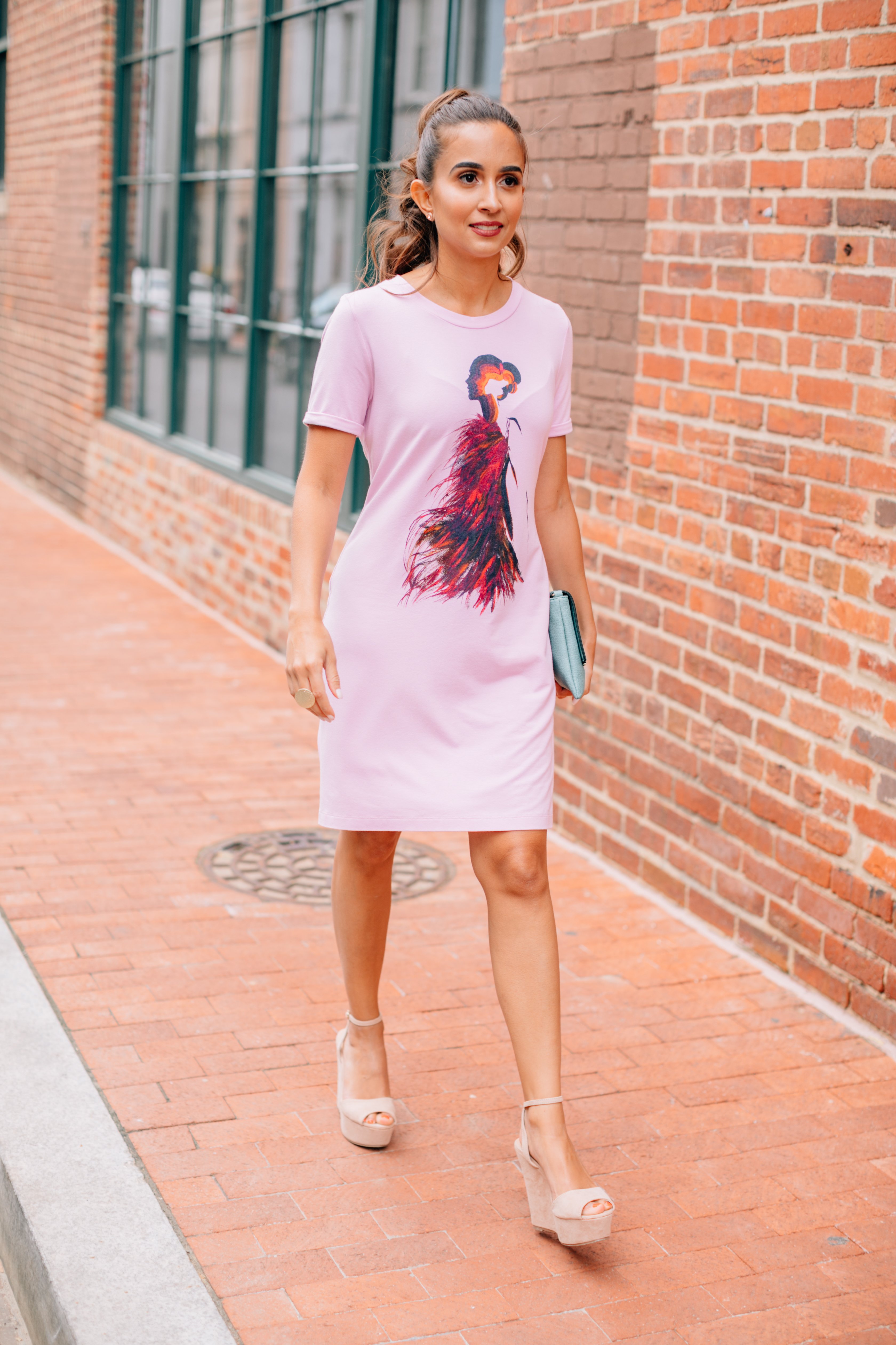 A stylish Firestarter Dress featuring a tailored silhouette, cuffed 3/4 sleeves, and unique custom artwork in Pink Lavender color.