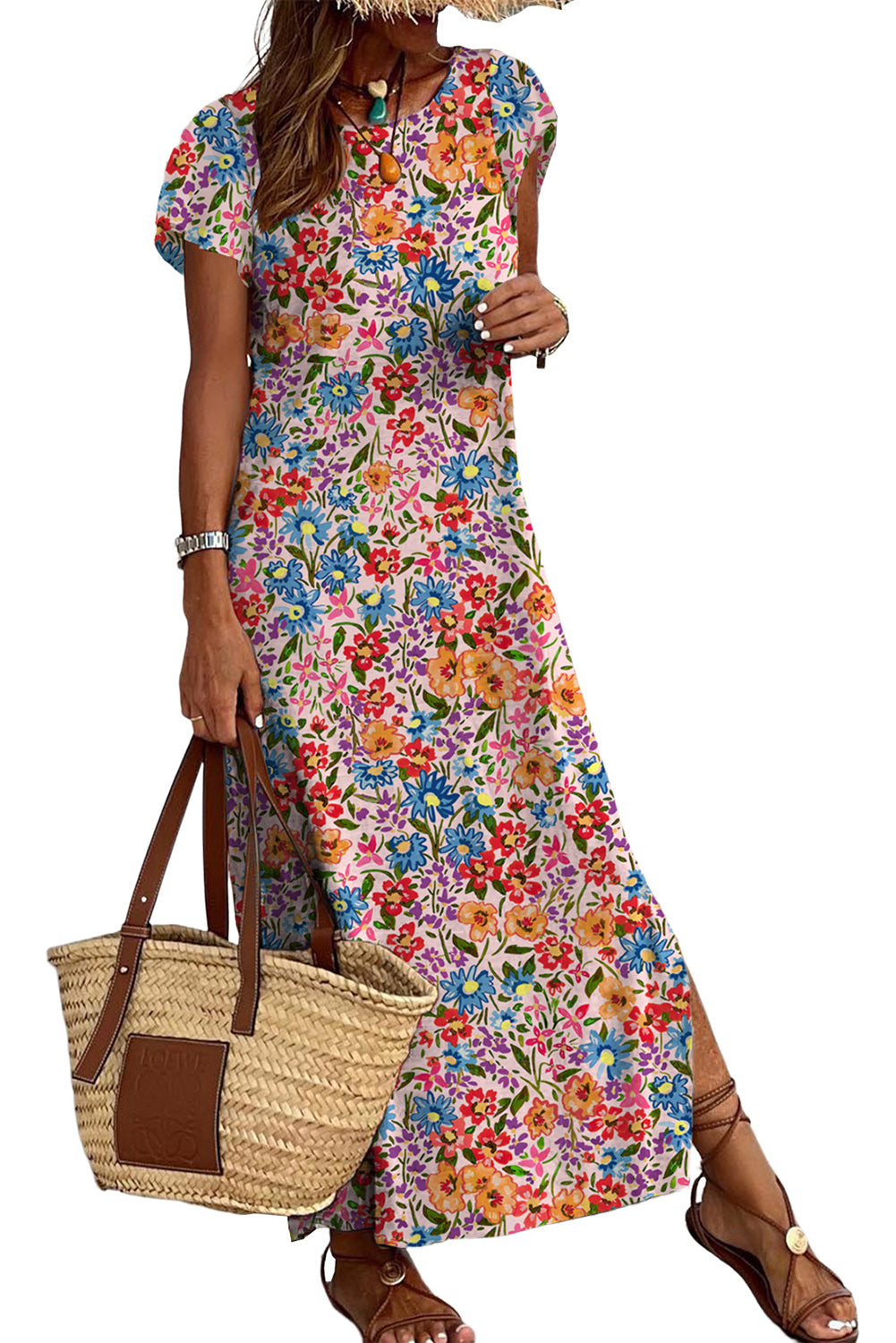 A vibrant floral print holiday dress featuring a round neck, short sleeves, and a side slit, perfect for summer outings.