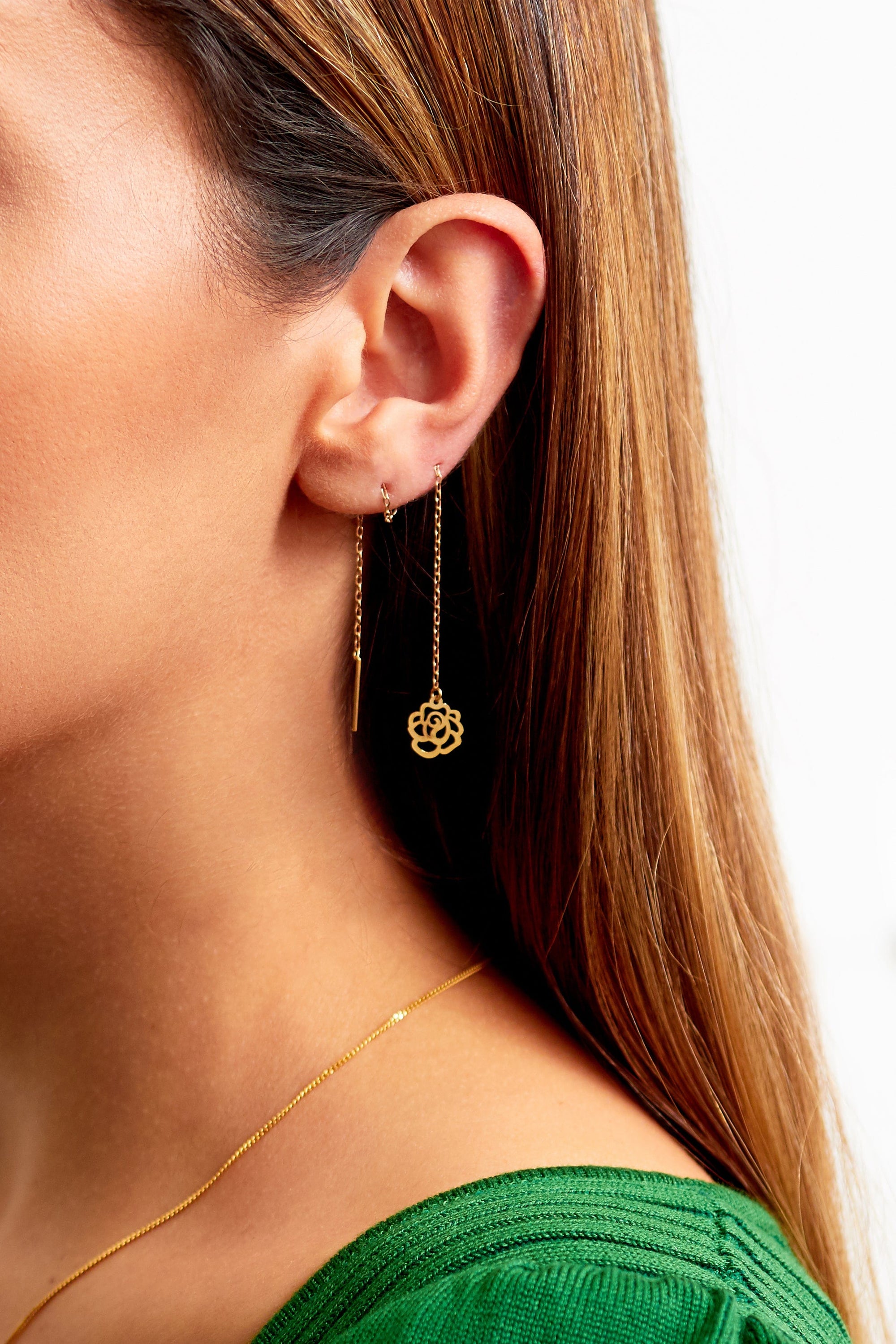 Elegant gold thread through earrings with flower design, handcrafted in 18K gold, showcasing intricate detailing.