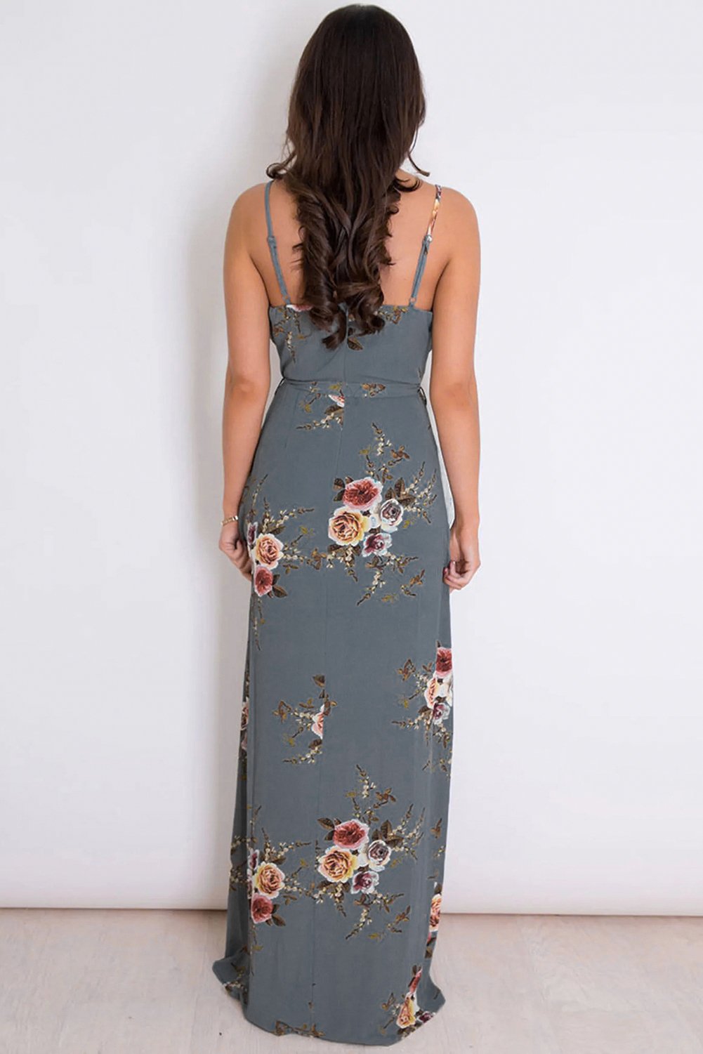 Gray Floral Spaghetti Strap Wrap Slit Maxi Dress featuring a deep V-neck and unique floral print, perfect for stylish occasions.