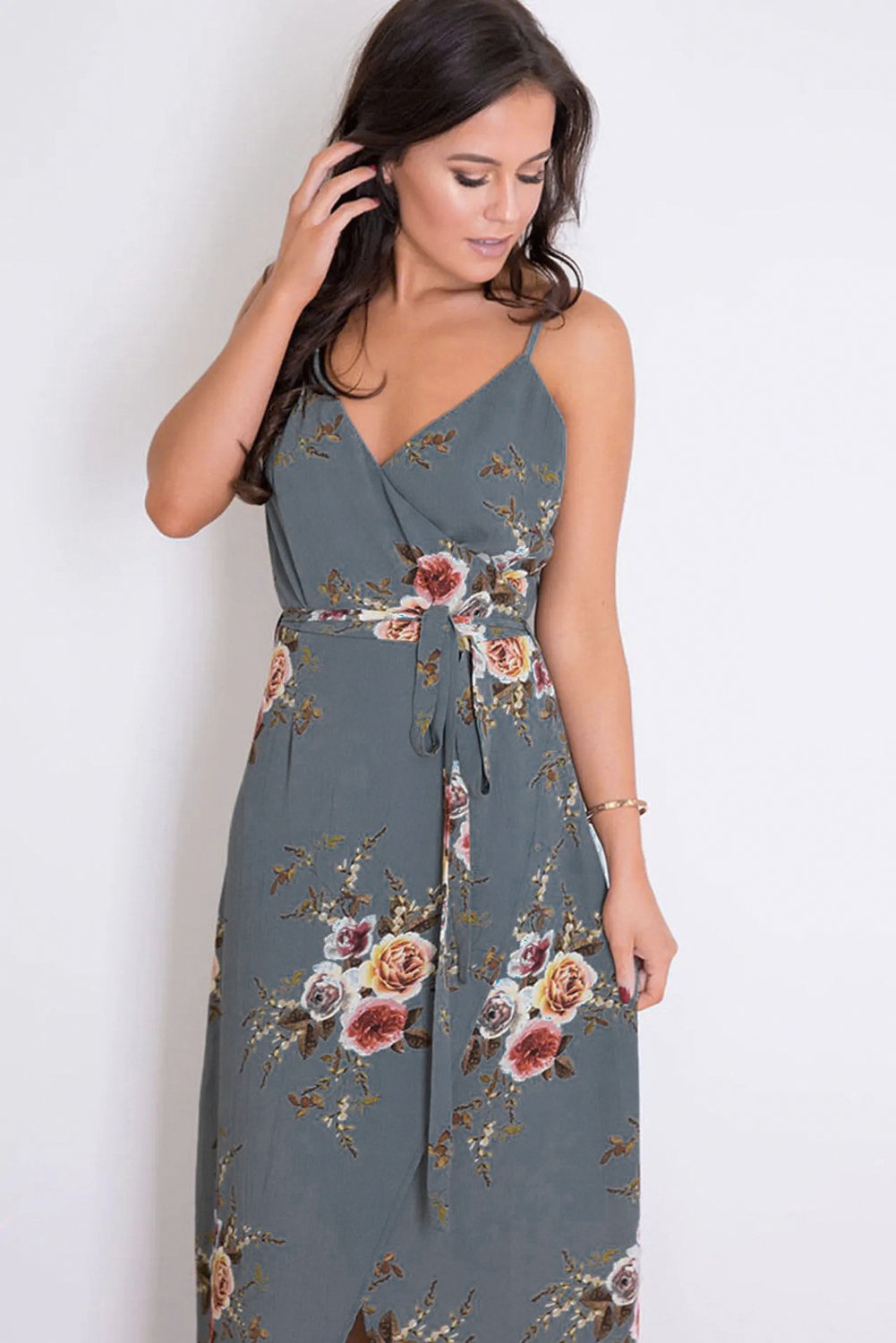 Gray Floral Spaghetti Strap Wrap Slit Maxi Dress featuring a deep V-neck and unique floral print, perfect for stylish occasions.