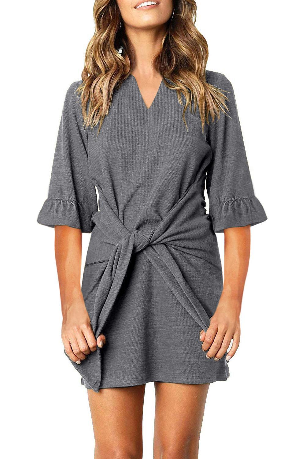 Gray mini dress featuring a v-neckline, ruffled half sleeves, and a waist tie, perfect for casual and dressy occasions.