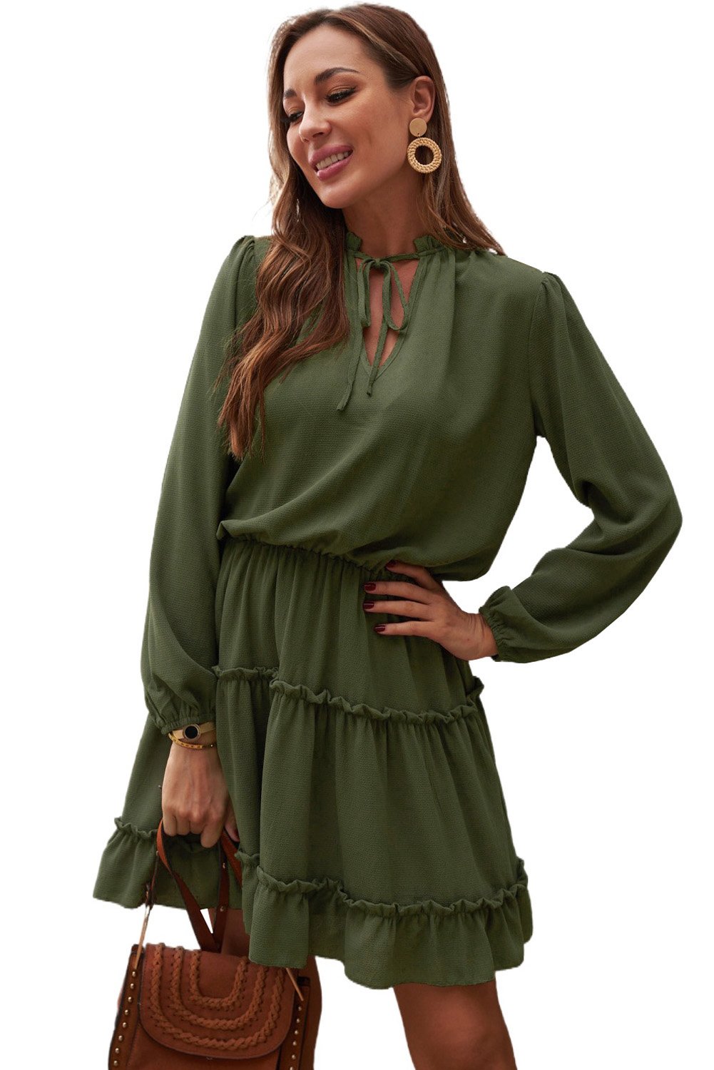 A stylish green V neck long sleeve mini dress with ruffles and a tiered design, perfect for elegant occasions.