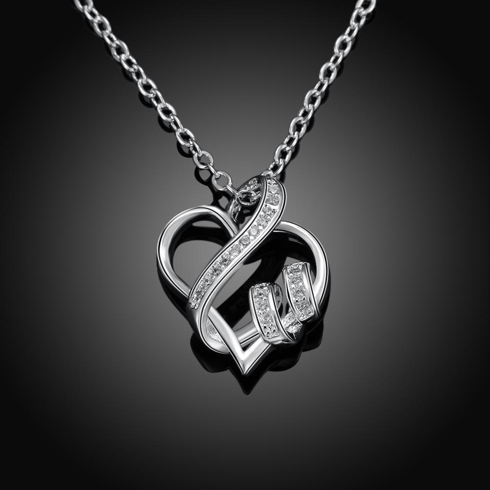 Intertwined Hearts Necklace featuring Swarovski crystals and 18K gold plating, elegantly designed with a delicate chain.