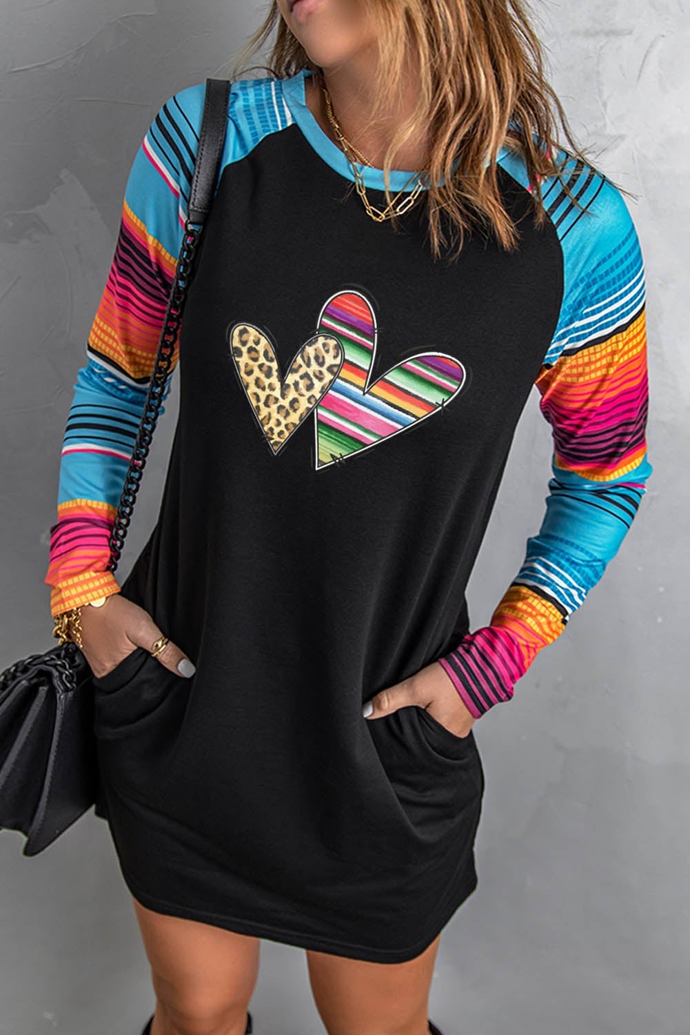 Leopard Serape Hearts Mini Dress featuring a stylish leopard print pattern and long sleeves, perfect for casual wear.