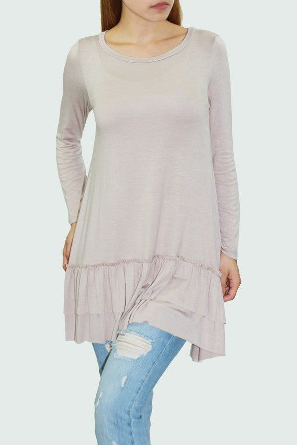 Beige long sleeve tunic with pleated bottom, showcasing a round neck and comfortable fit, perfect for casual or night out styles.