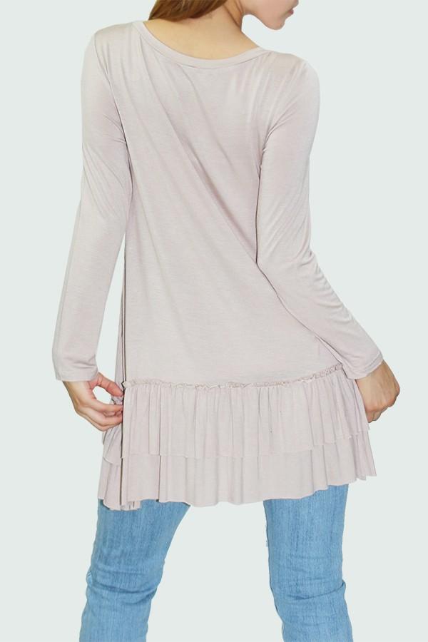 Beige long sleeve tunic with pleated bottom, showcasing a round neck and comfortable fit, perfect for casual or night out styles.