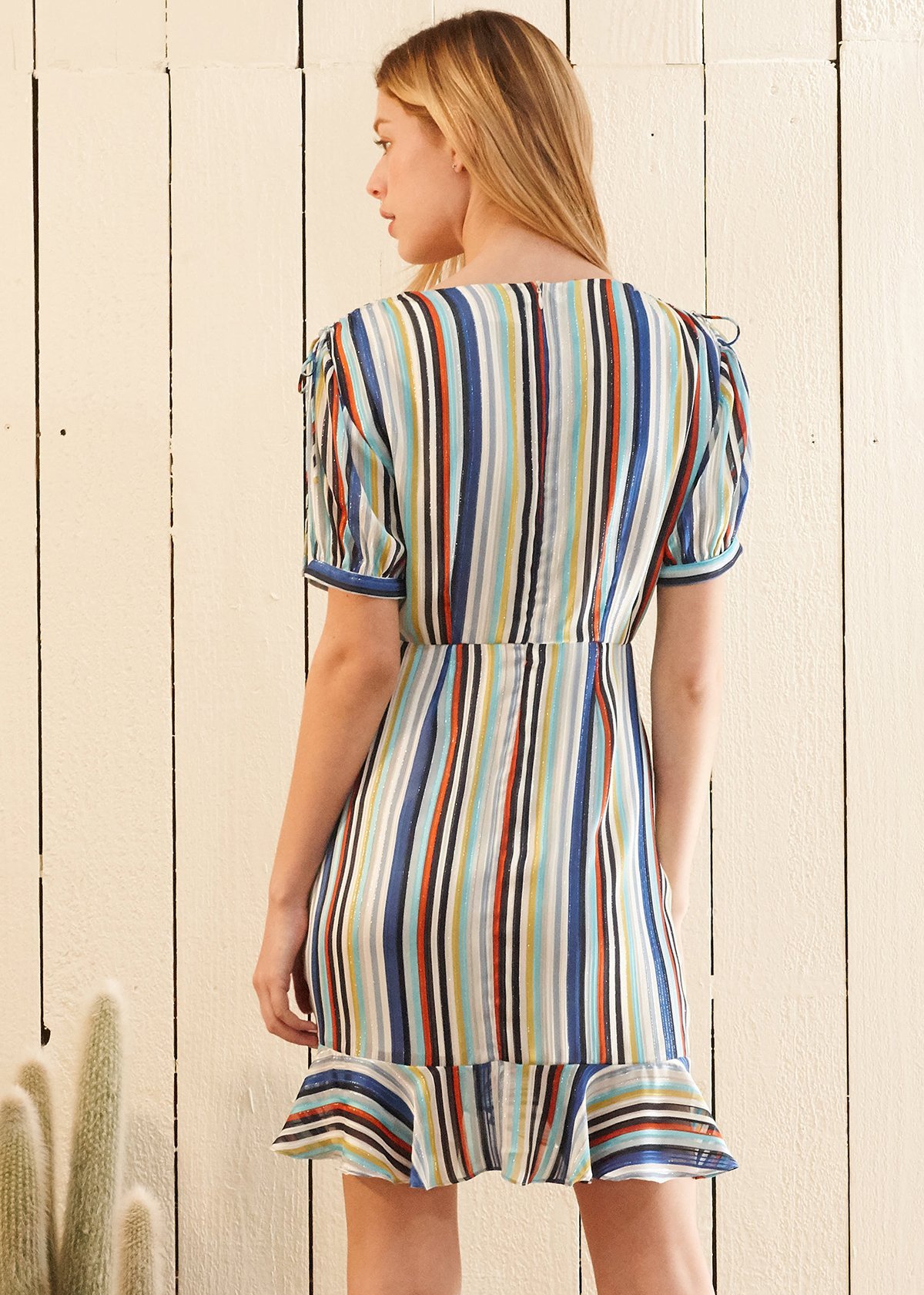 Multi-color ruched dress featuring adjustable side gathering, bow tie shoulder straps, and puffy sleeves, perfect for summer outings.