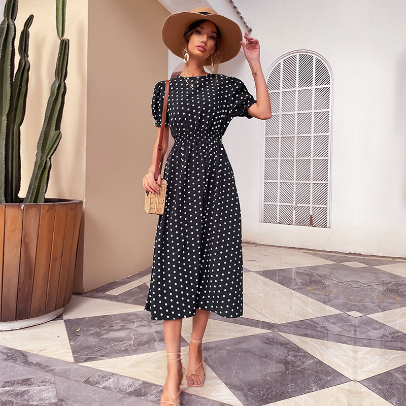 New European and American Style Midi Skirt featuring a polka dot pattern and A-line design, perfect for retro-inspired fashion.