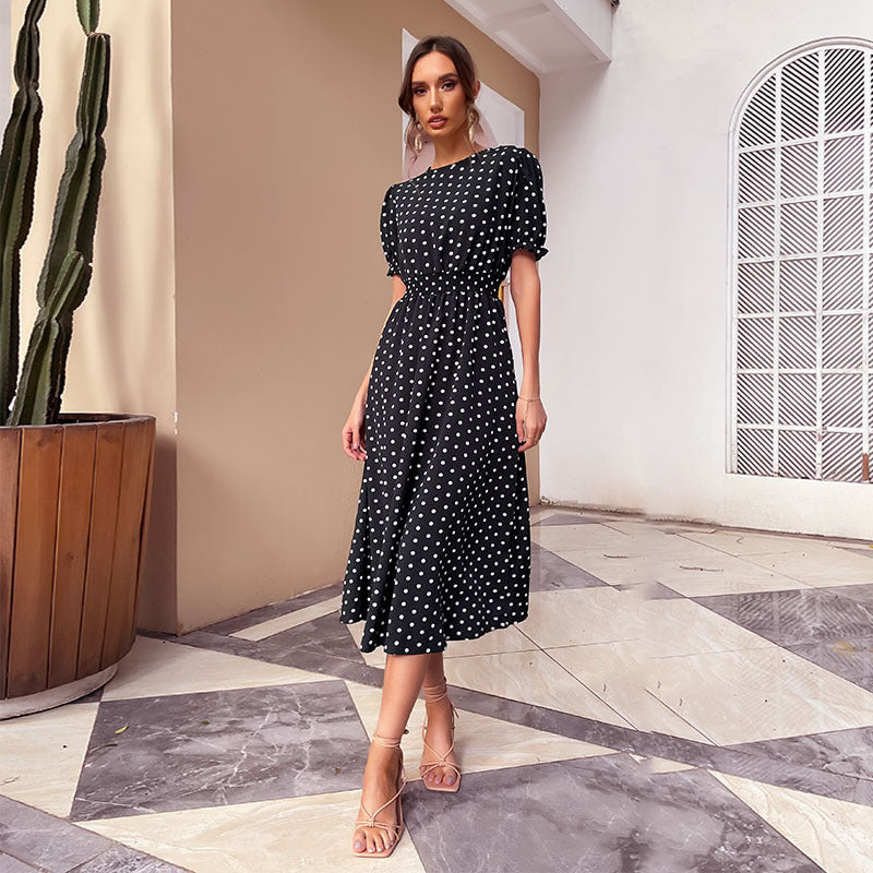 New European and American Style Midi Skirt featuring a polka dot pattern and A-line design, perfect for retro-inspired fashion.