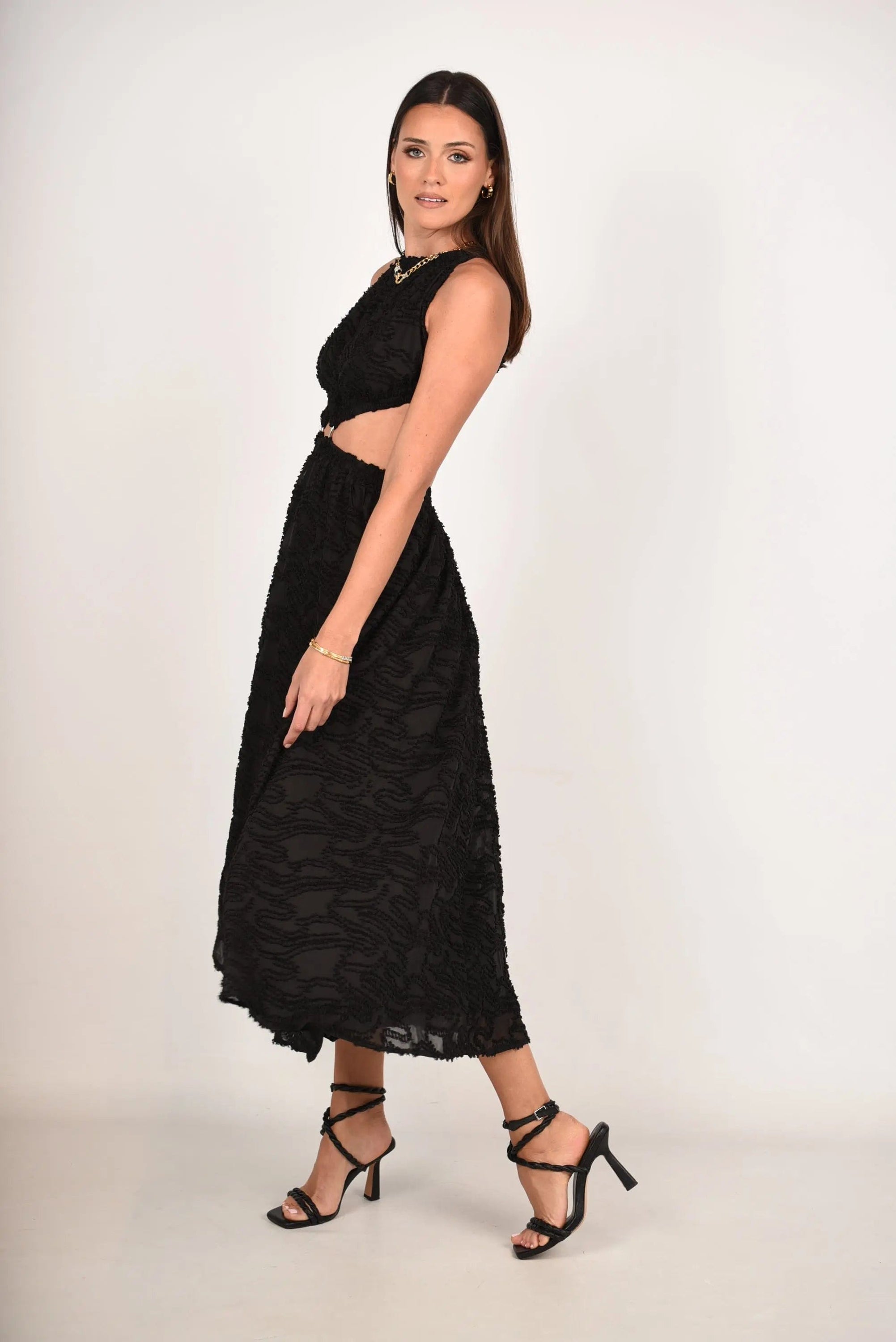 Out Of Your Reach Maxi Dress featuring a lightweight flocked jacquard fabric, open back design, and elastic shoulder straps, perfect for summer events.