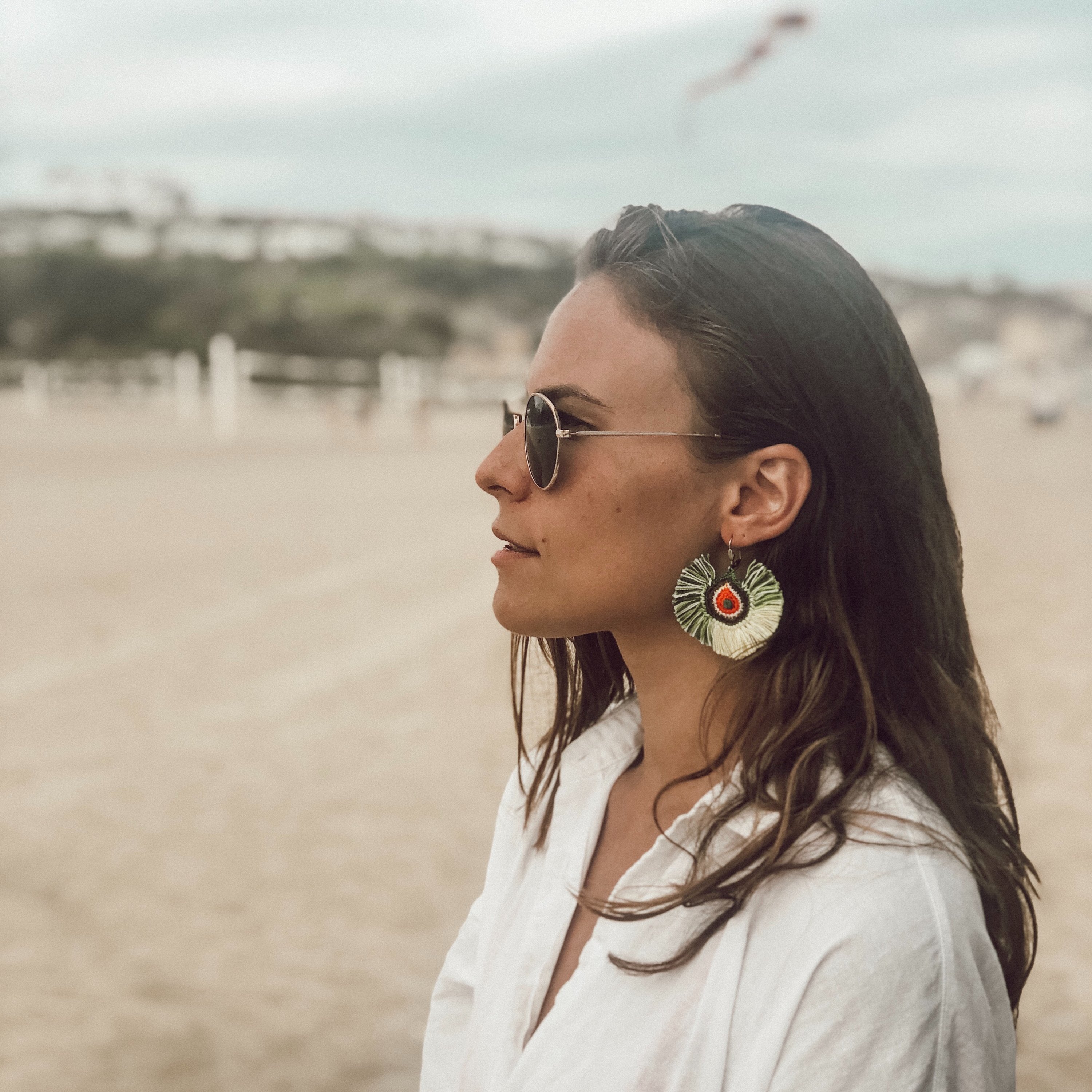 Colorful Pedro Fringe Earrings, hand-embroidered by artisans in Turkey, featuring a vibrant design perfect for any occasion.