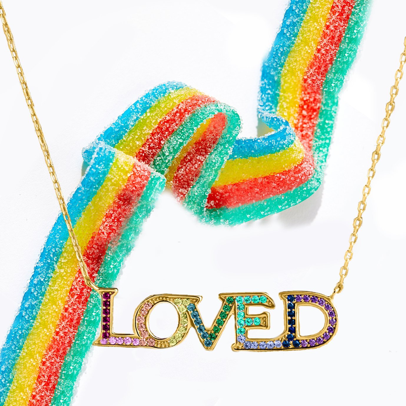 Elegant 18K gold plated pendant necklace featuring rainbow Swarovski crystals, showcasing vibrant colors and a stylish link chain.