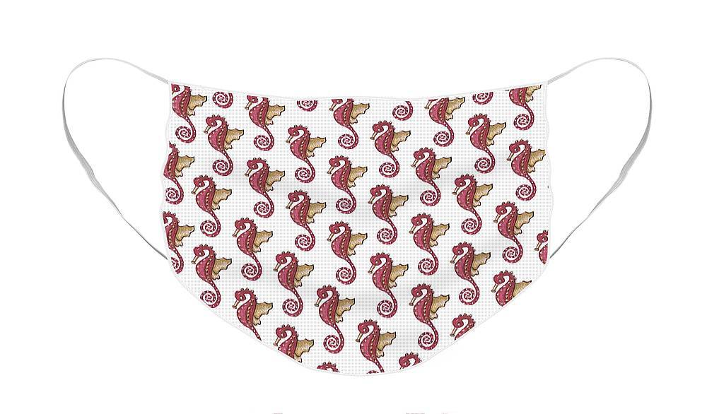 Red and white seahorse patterned cloth face mask with elastic loops for a comfortable fit.