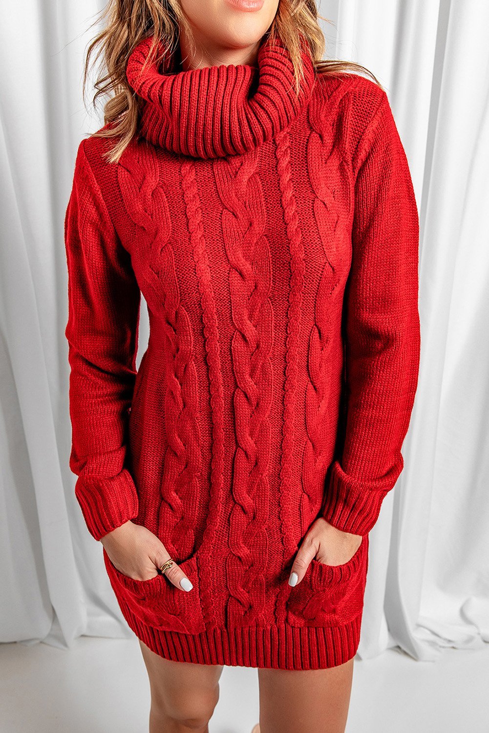 A stylish red cowl neck sweater dress with full sleeves and pockets, perfect for winter wear.