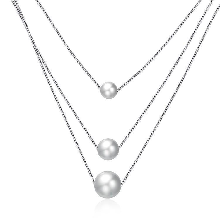 Triple Dangling Pearl Layer Sterling Silver Necklace featuring three elegant pearls on a delicate link chain.