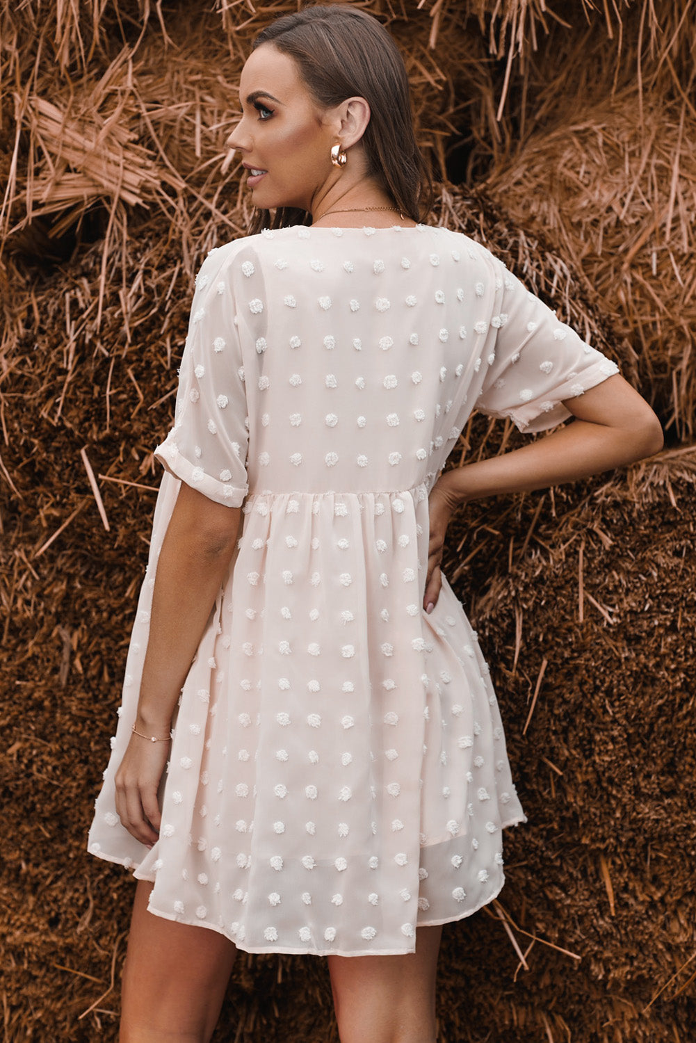 Woman in polka dot dress.