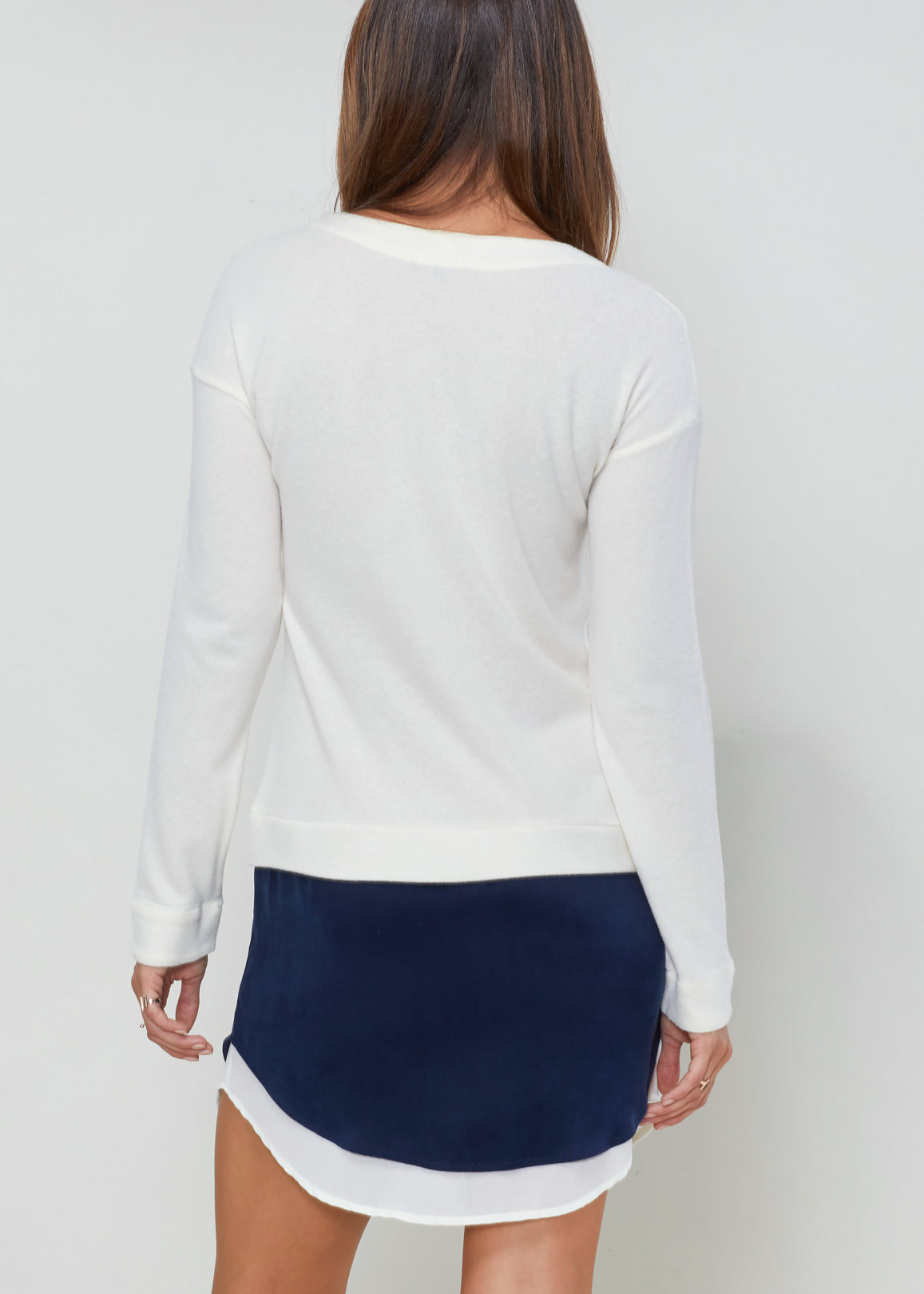 Women Twofer Pullover Sweater Dress featuring long sleeves and a chest pocket, made from a soft cotton blend.