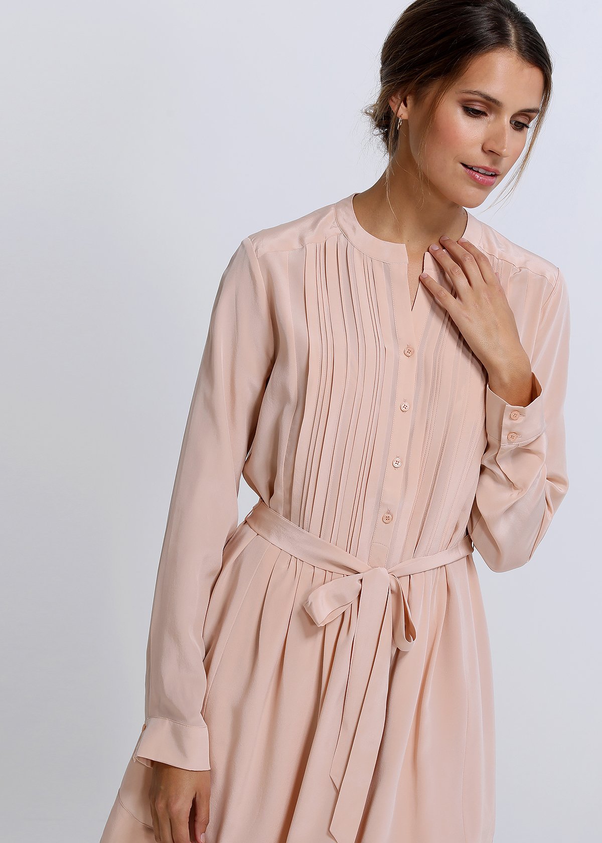 A stylish Women's 100% Silk Pleated Dress featuring a round split collar, pleated front detail, and a removable waist strap, elegantly displayed.