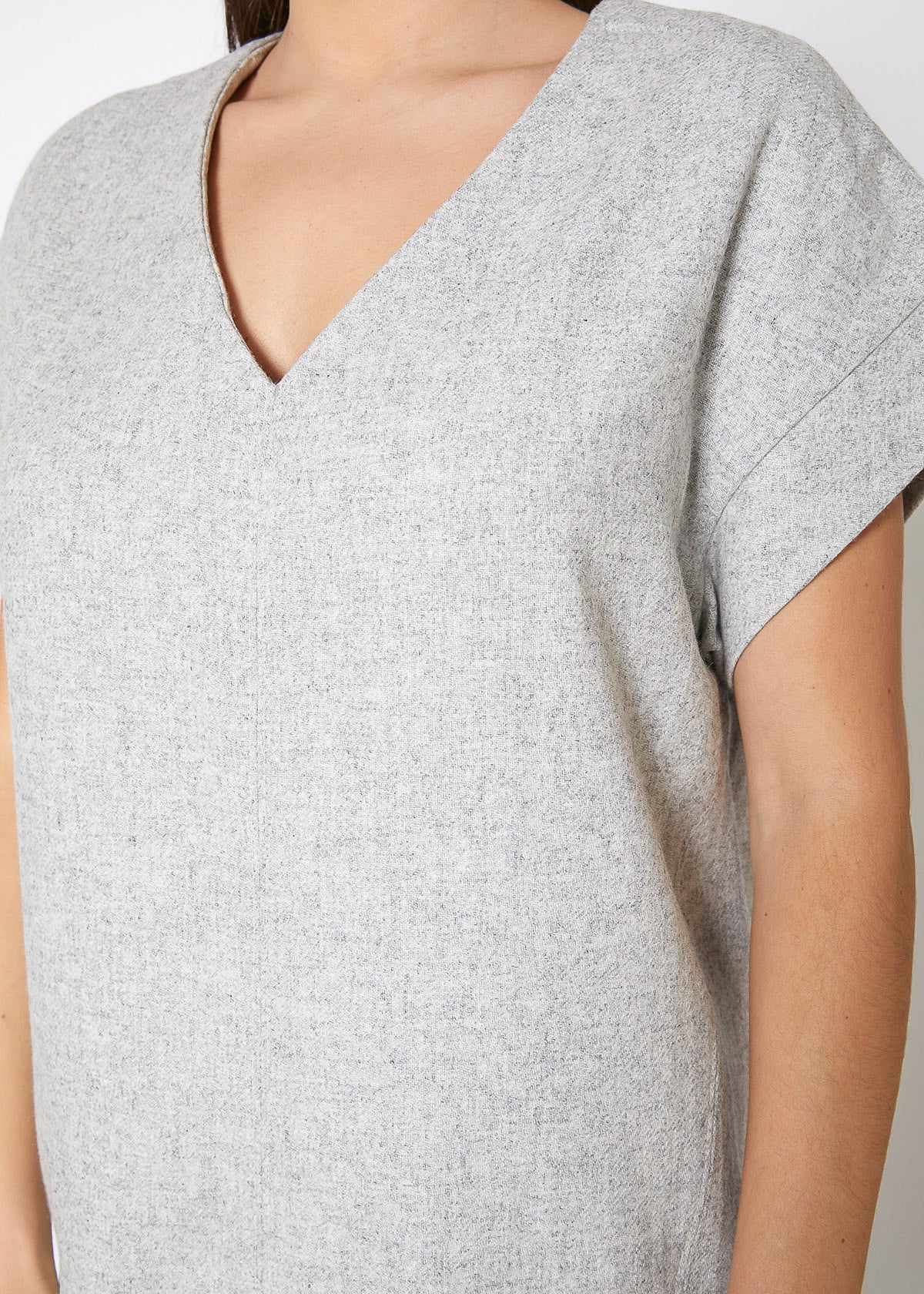 Women's Casual Heather Grey V-Neck Dress displayed on a model, showcasing its stylish design and flattering fit.