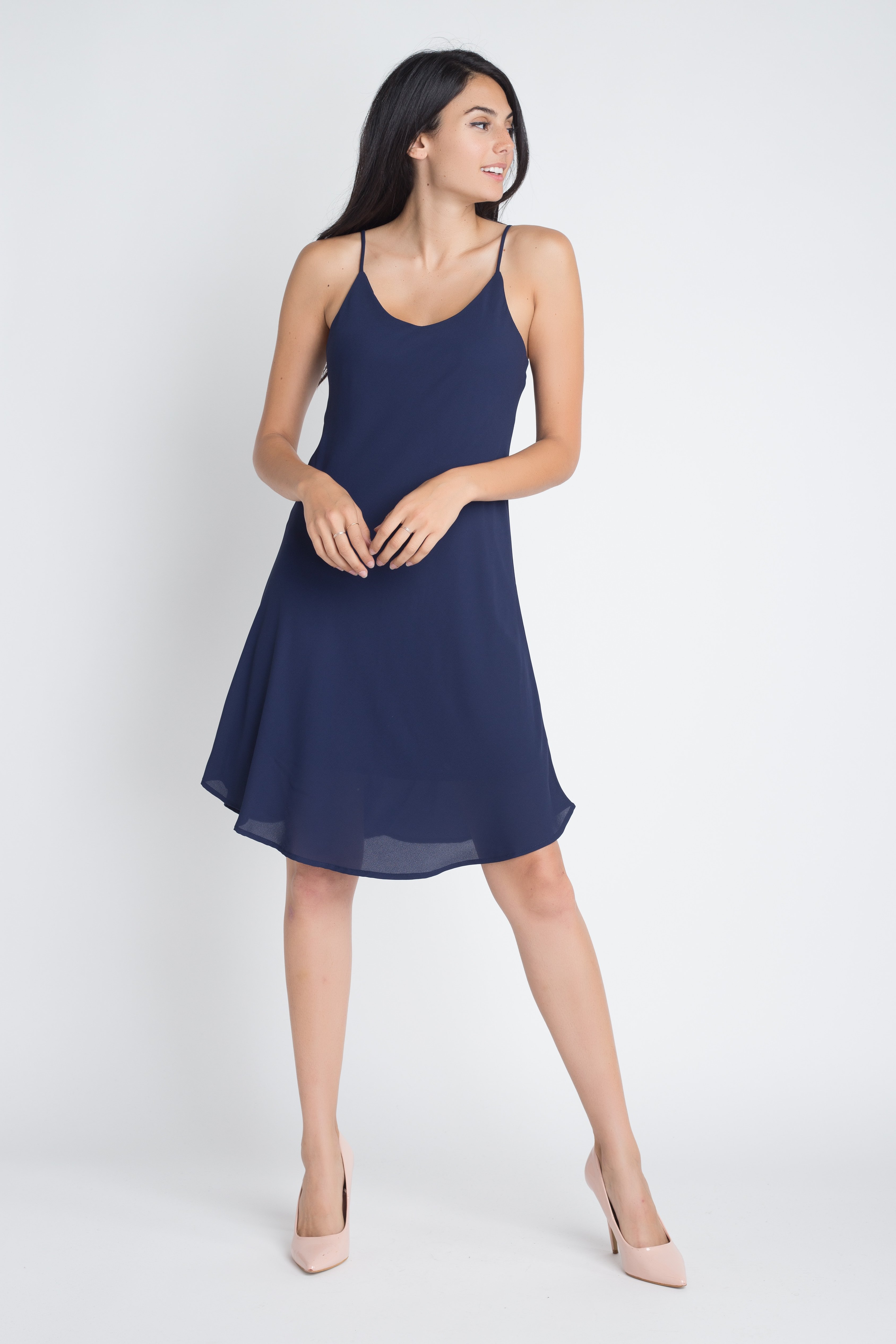 A stylish Women's Casual Sleeveless Flowy Dress featuring a criss-cross back detail, perfect for summer outings.