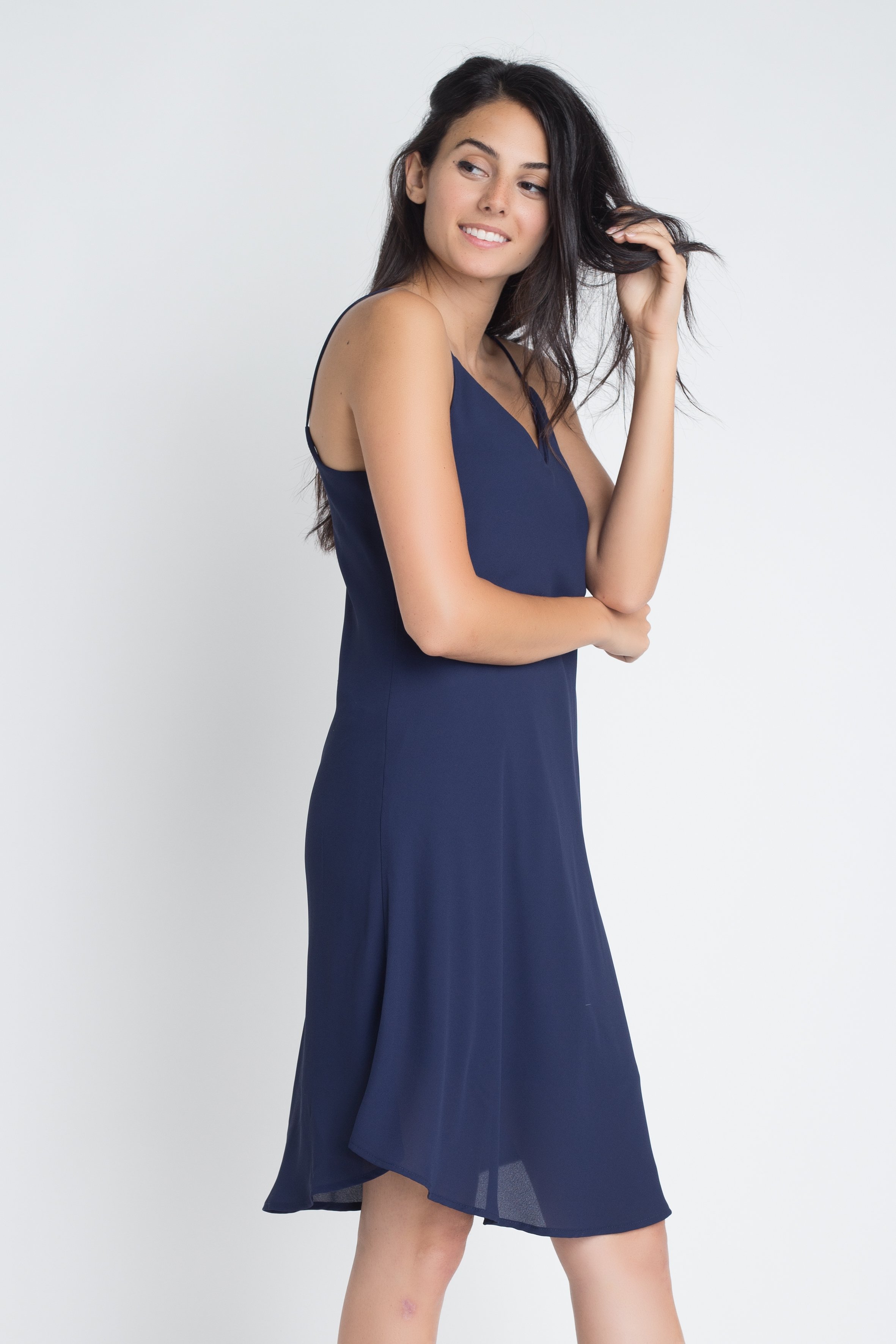 A stylish Women's Casual Sleeveless Flowy Dress featuring a criss-cross back detail, perfect for summer outings.