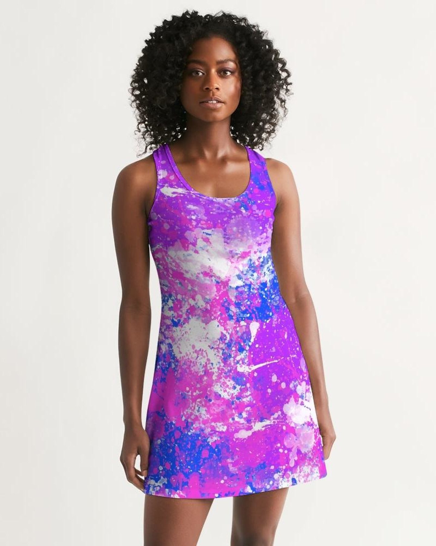 A stylish Cotton Candy Purple Racerback Dress, showcasing a scoop neckline and above-knee length, perfect for casual outings.