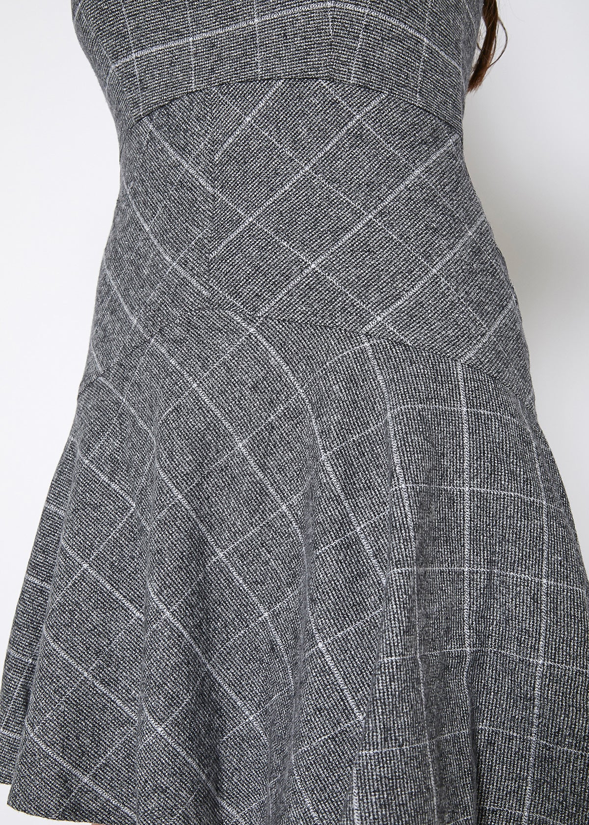 Women's Fit & Flare Tank Dress in Gray Plaid, showcasing a stylish design with a back zipper closure and sleeveless cut.