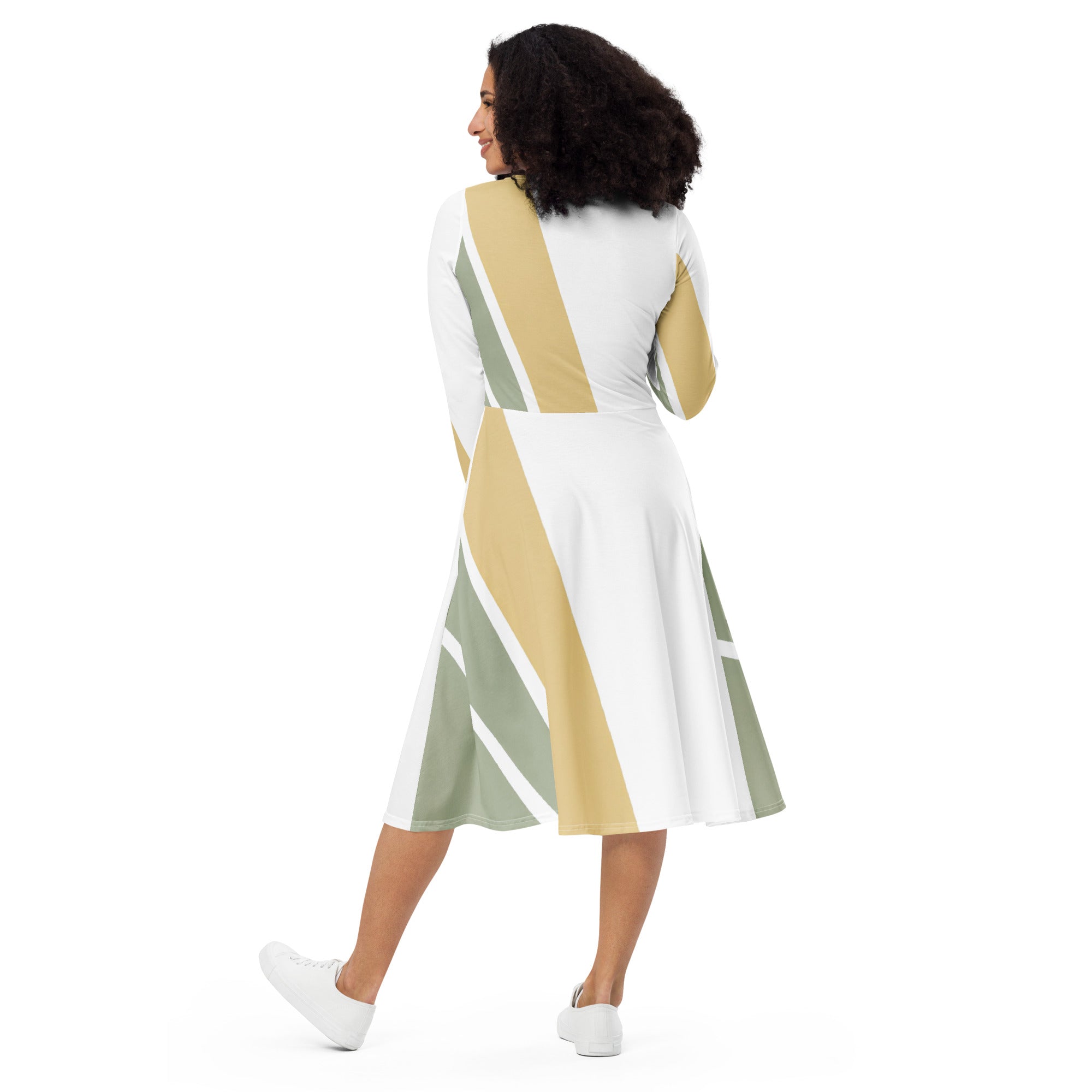 Womens Long Sleeve Midi Dress featuring a green abstract geometric pattern, showcasing its fitted waist, flared bottom, and side pockets.