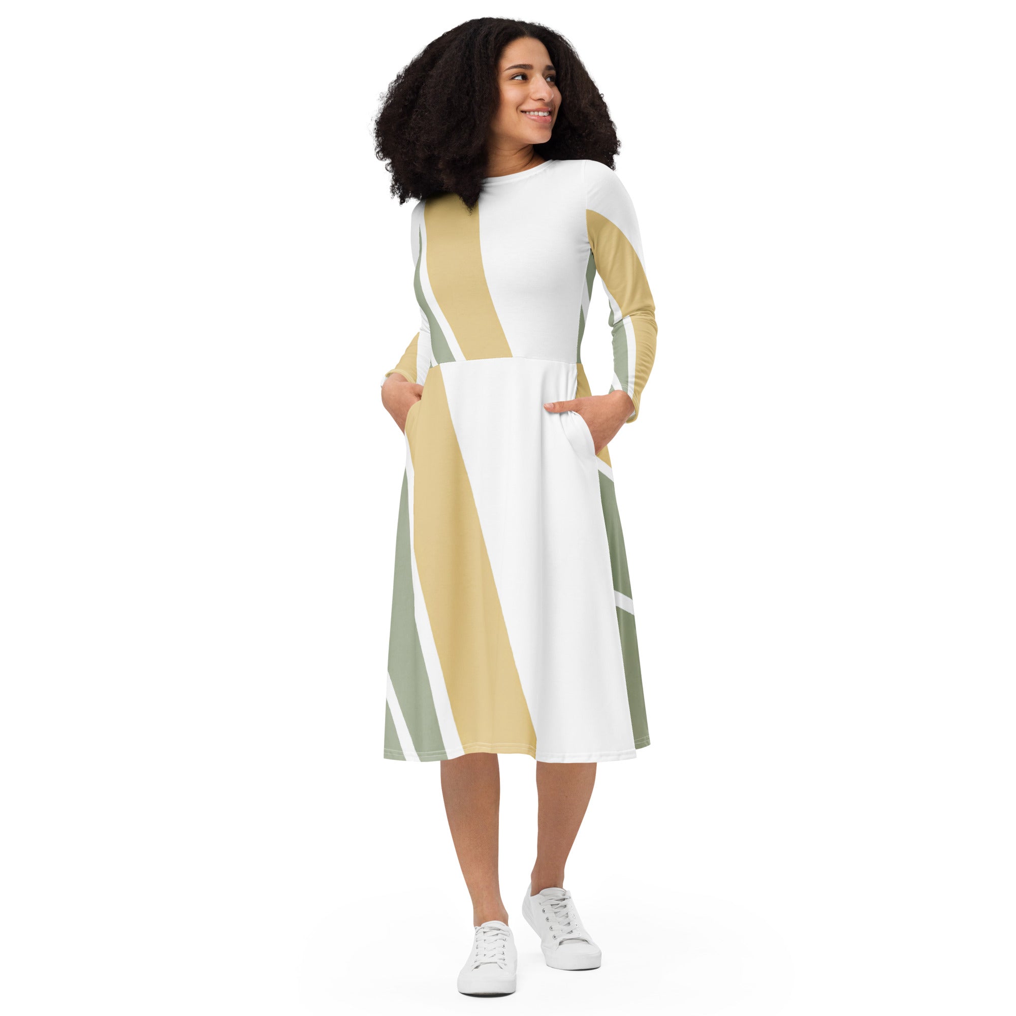 Womens Long Sleeve Midi Dress featuring a green abstract geometric pattern, showcasing its fitted waist, flared bottom, and side pockets.