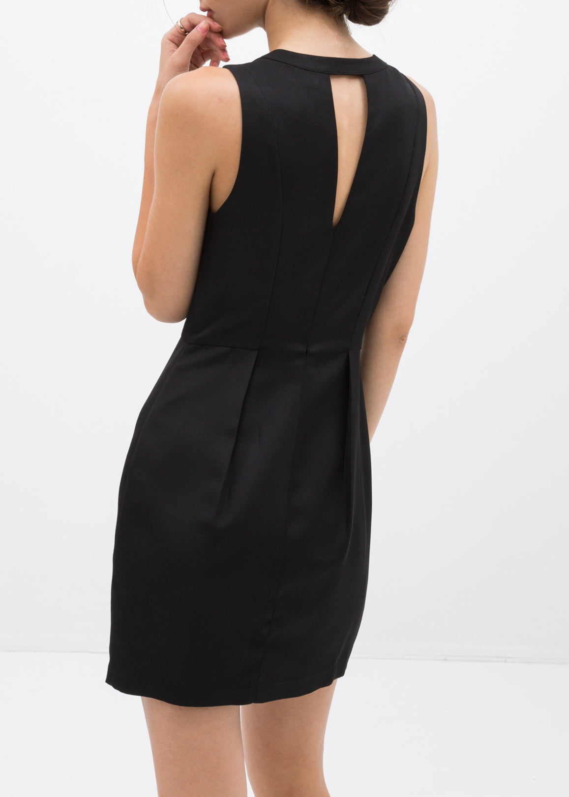 Women's sleeveless black cocktail dress featuring a keyhole opening and cropped back design, perfect for elegant occasions.