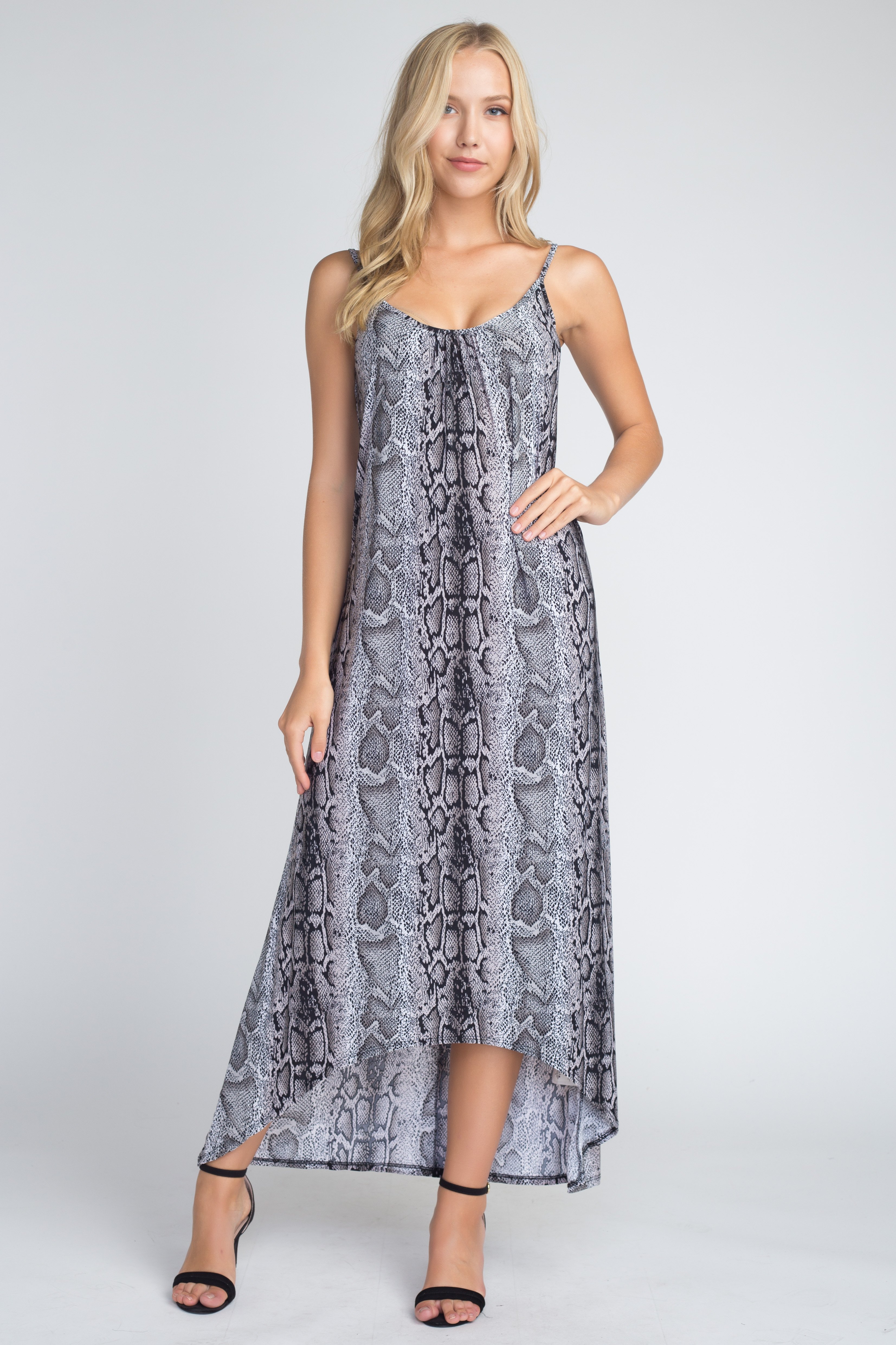 A stylish Women's Snakeskin Print Maxi Tank Dress featuring a trendy snakeskin pattern, flowing fabric, and a comfortable tank top design, perfect for summer outings.