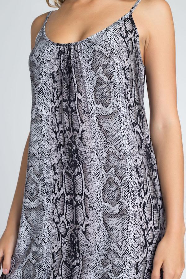 A stylish Women's Snakeskin Print Maxi Tank Dress featuring a trendy snakeskin pattern, flowing fabric, and a comfortable tank top design, perfect for summer outings.